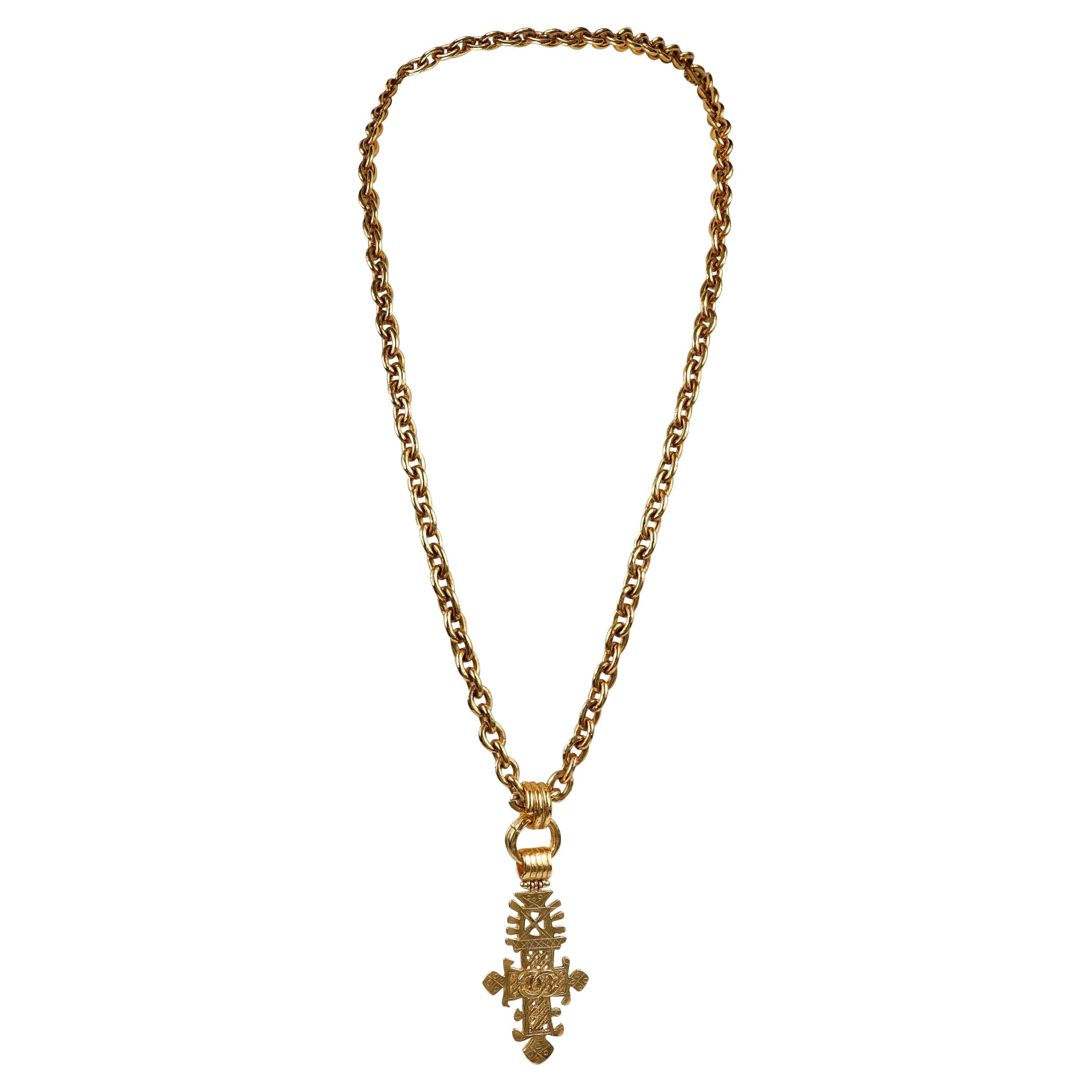 Chanel Vintage Large Gold CC Ornate Cross Necklace  For Sale