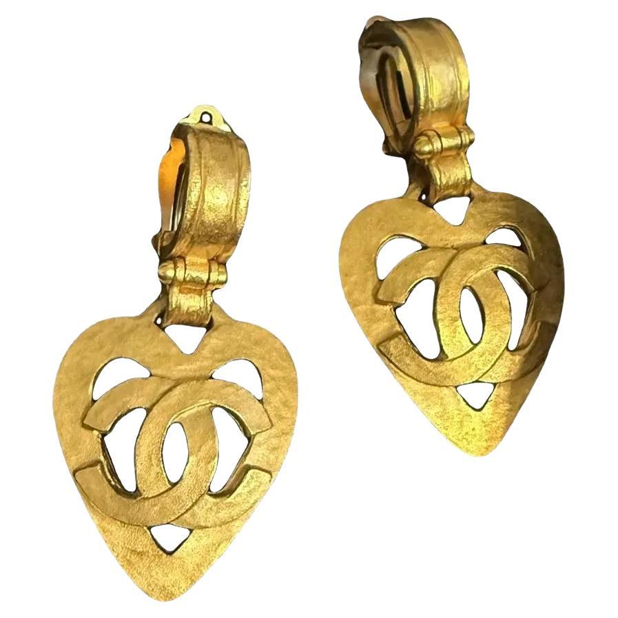 CHANEL Vintage Large Gold Heart CC Logo Drop Clip On Earrings, circa 1995 For Sale