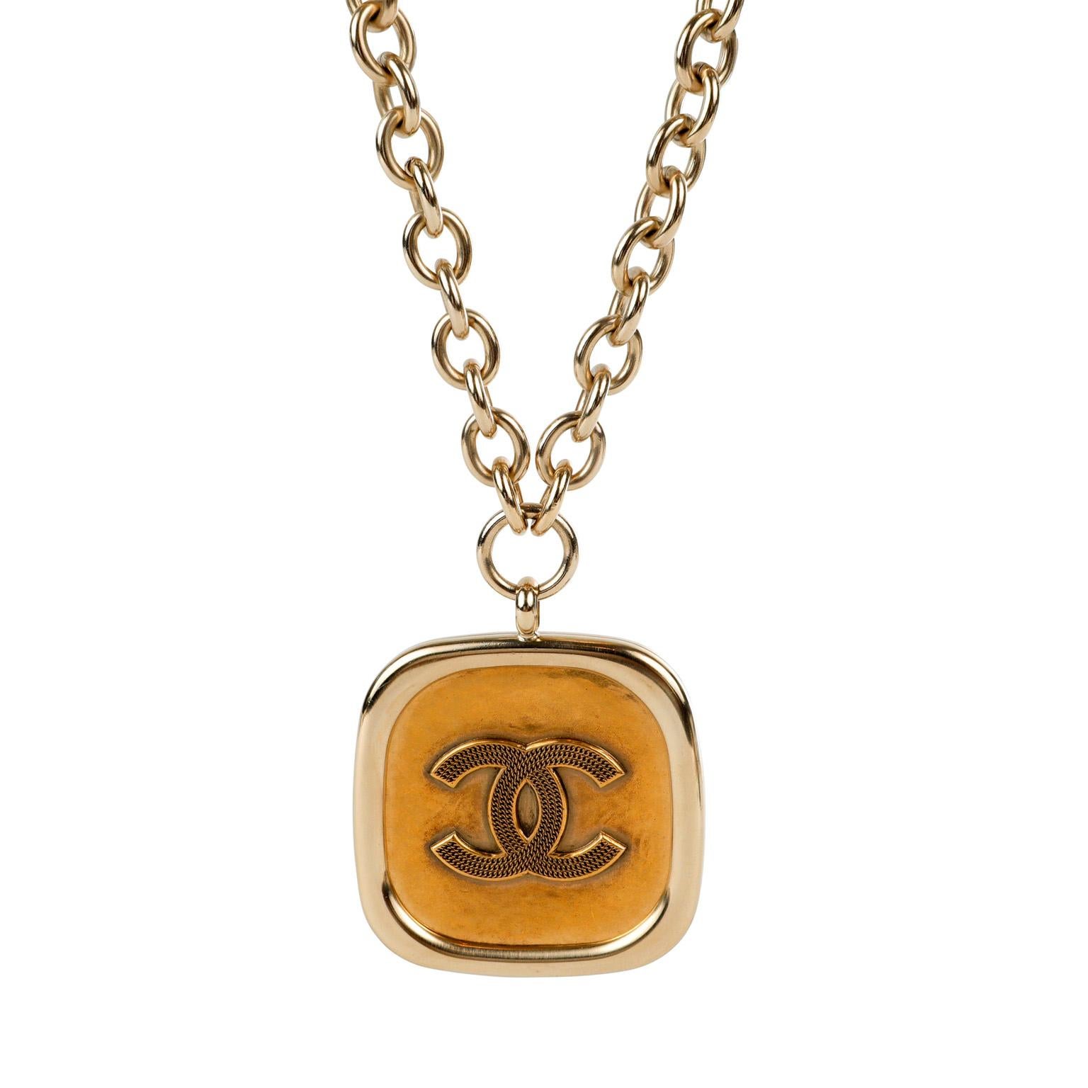 big gold medallion pendant