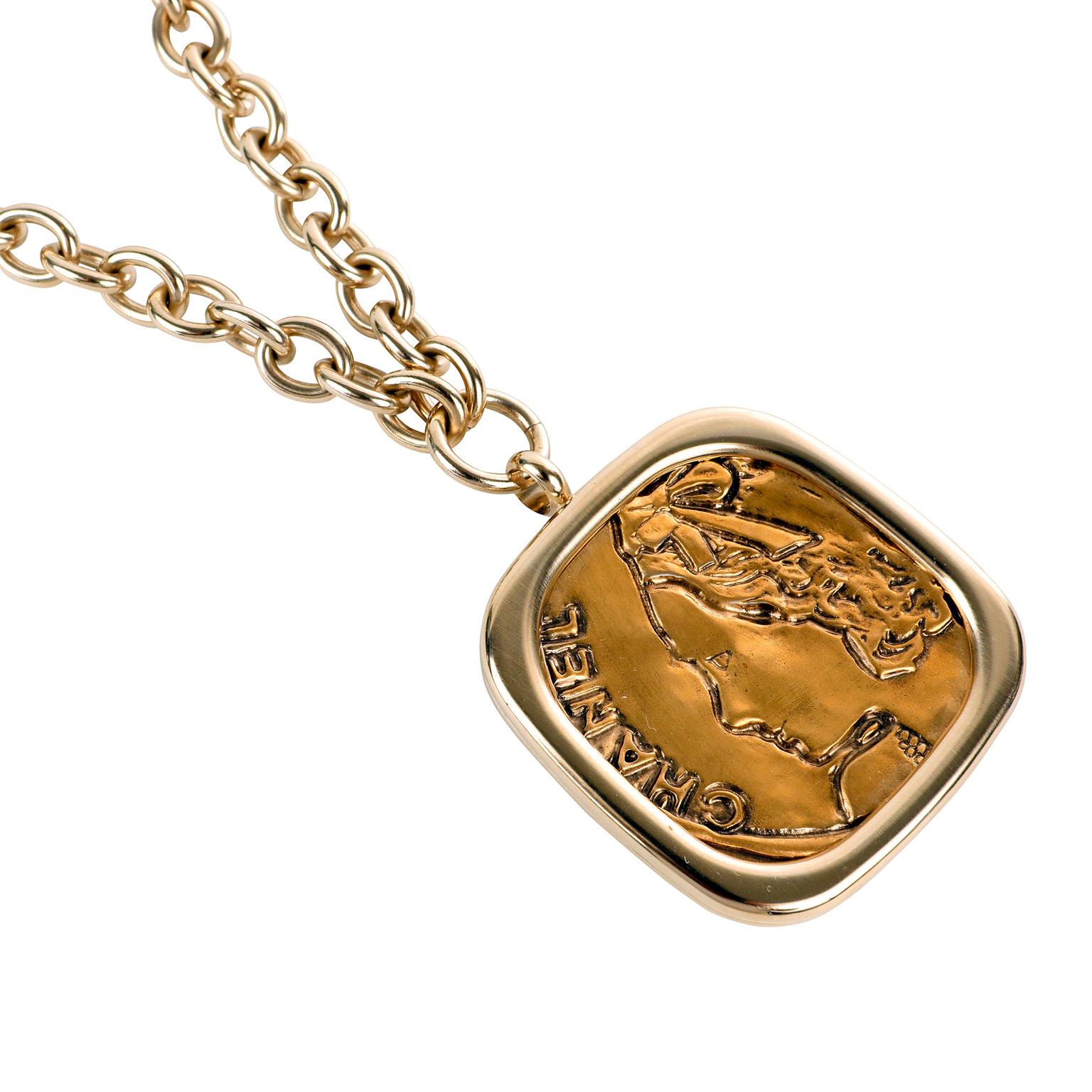 large gold medallion pendant