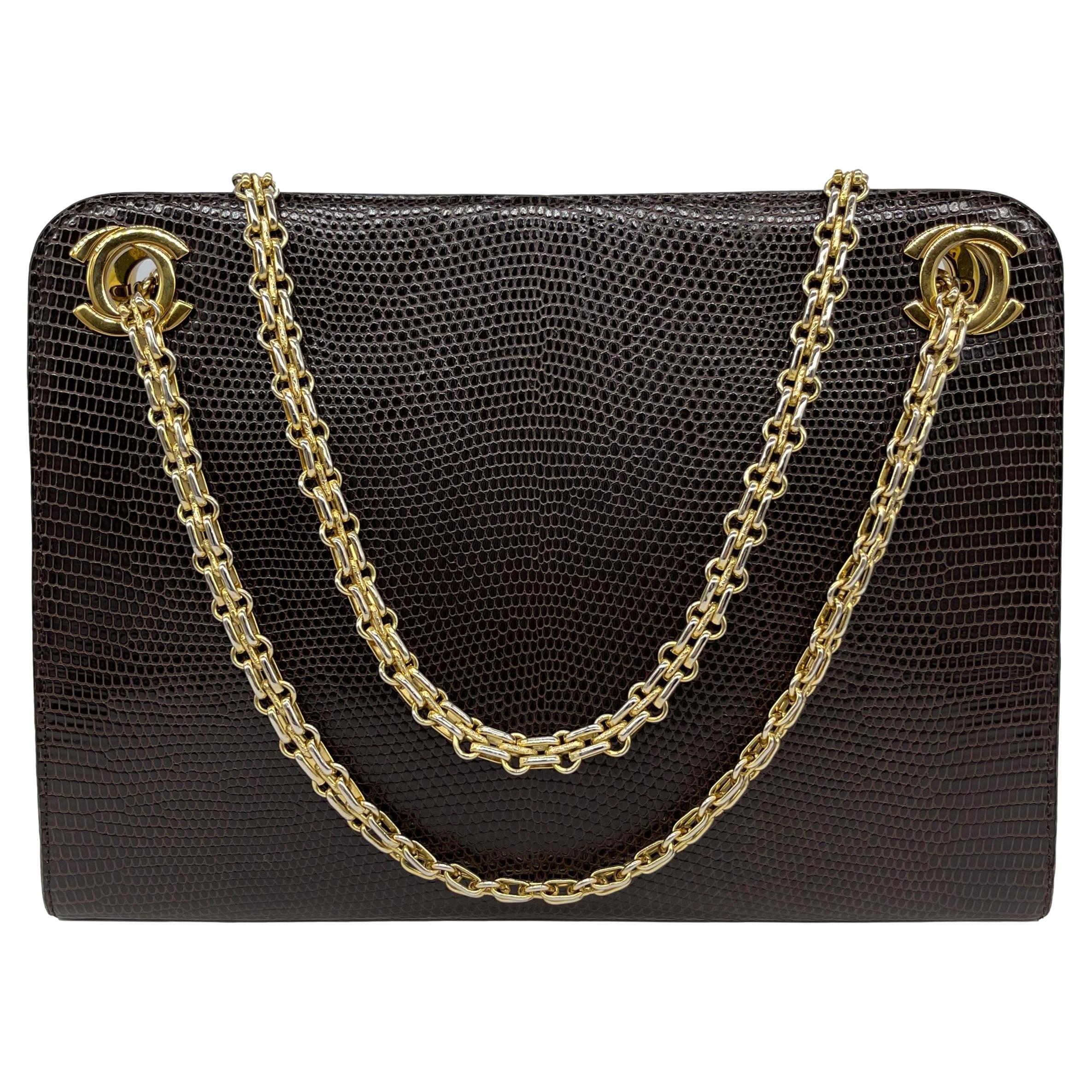 Chanel Vintage Lizard CC Bijoux Chain Shoulder Bag with Gold Hardware, 1980. Exceptional and rare, this highly sought after piece of Chanel history was produced before Chanel incorporated serial codes into their products, dating this bag to around