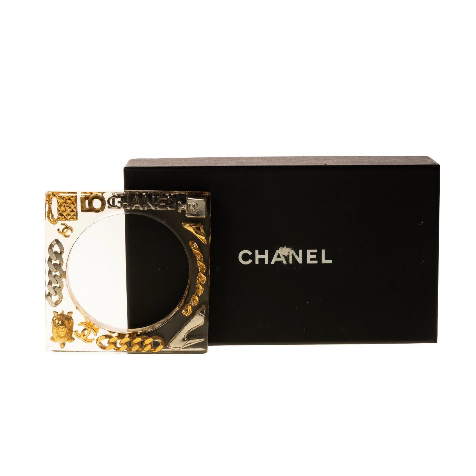 Women's or Men's Chanel Vintage Lucite Plexi Bangle Square Charms Cuff Bracelet (1997) For Sale
