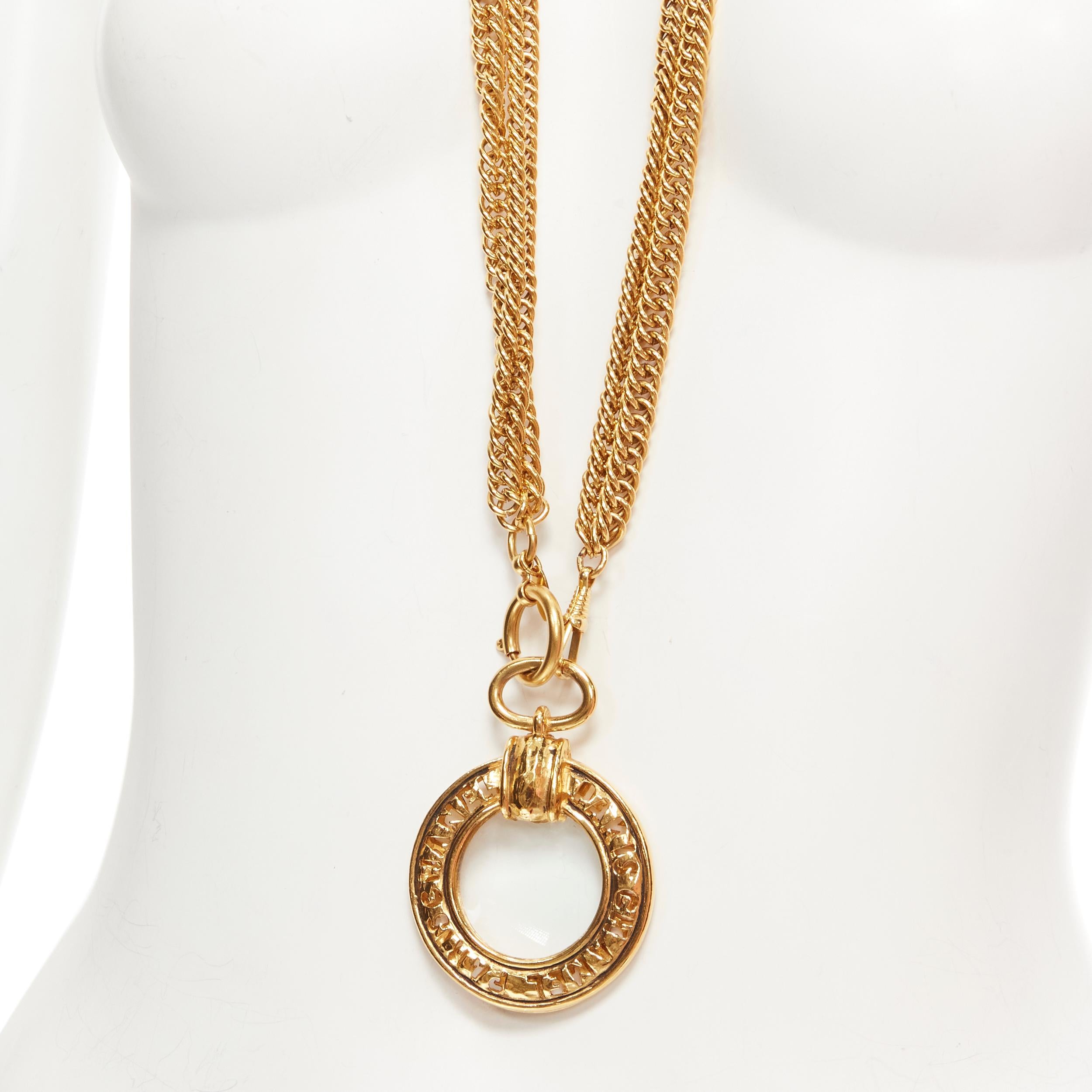 CHANEL Vintage Magnify Looking Glass pendant gold chunky chain loupe necklace 
Reference: GIYG/A00236 
Brand: Chanel 
Designer: Karl Lagerfeld 
Material: Metal 
Color: Gold 
Pattern: solid 
Closure: Lobster 
Extra Detail: Gold-tone metal chain