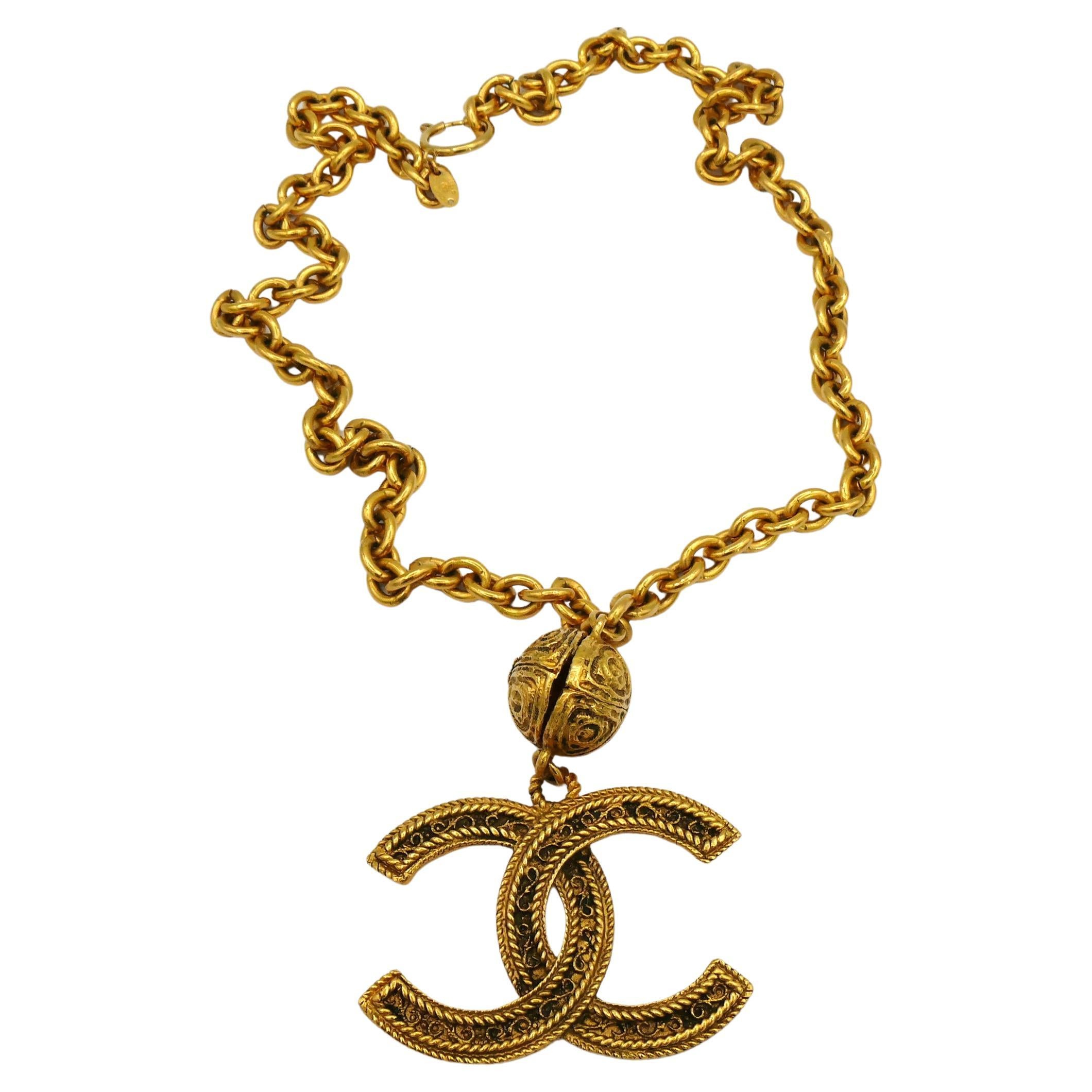 Vintage CHANEL CC Logo Sunburst Openwork Medallion Charm Necklace at  1stDibs