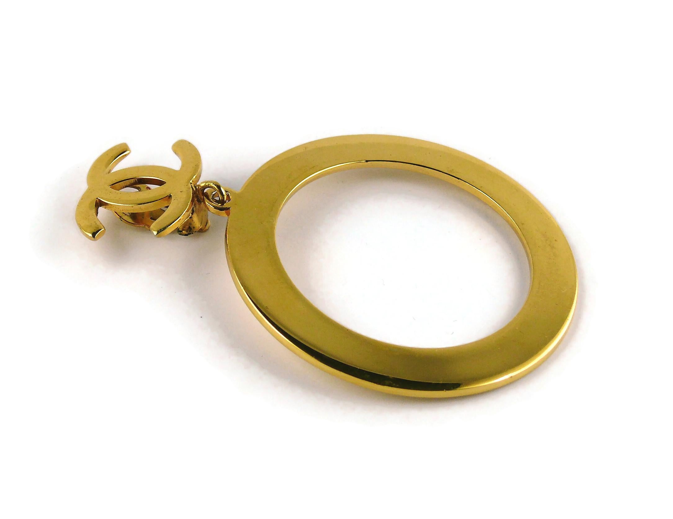 Women's Chanel Vintage Massive Gold Toned Iconic Hoop Dangling Earrings For Sale