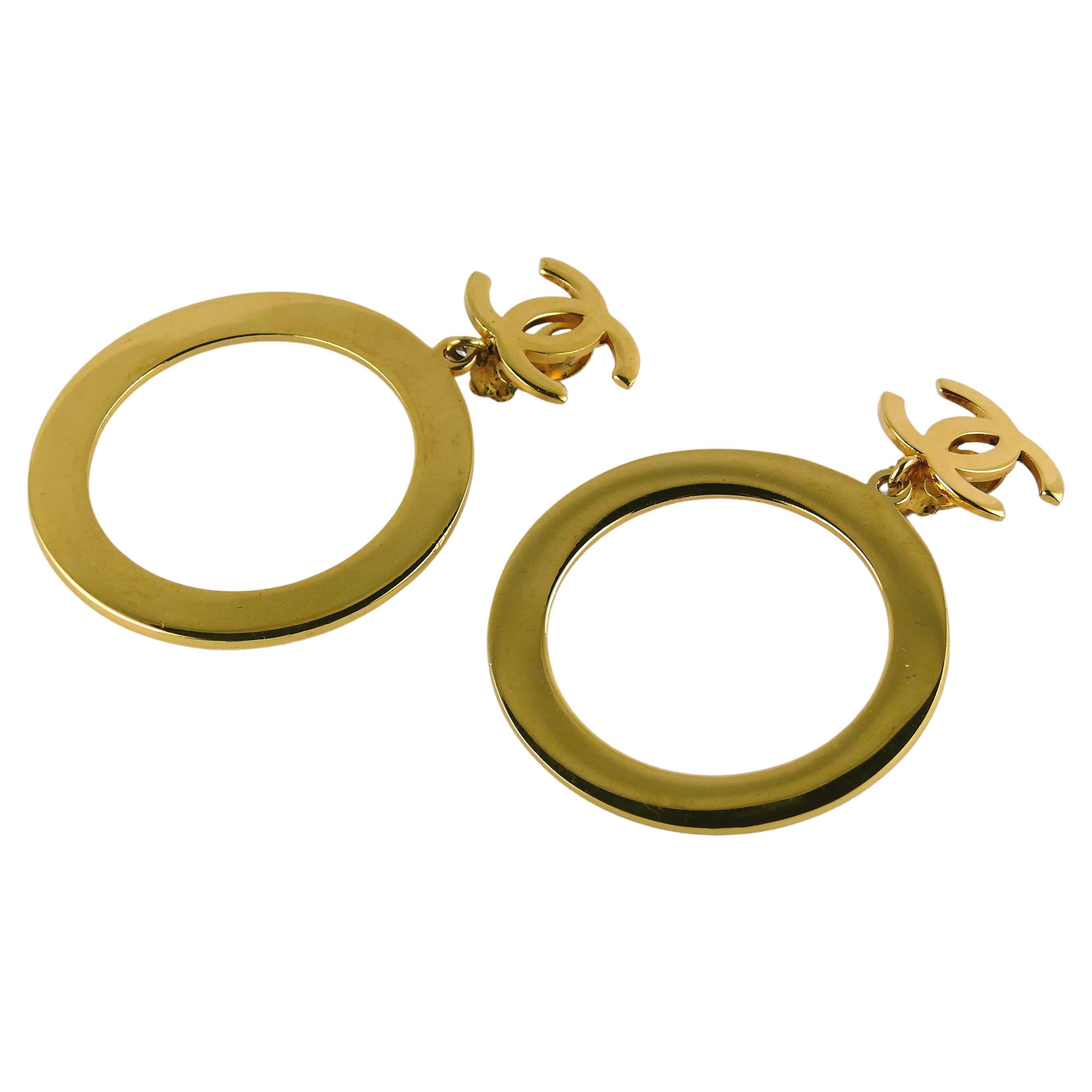 Chanel Vintage Massive Icone Toned Gold Hoop Dangling Earrings en vente