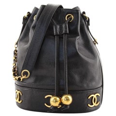 Sac seau à cordon coulissant vintage Chanel CC métallique Caviar Medium