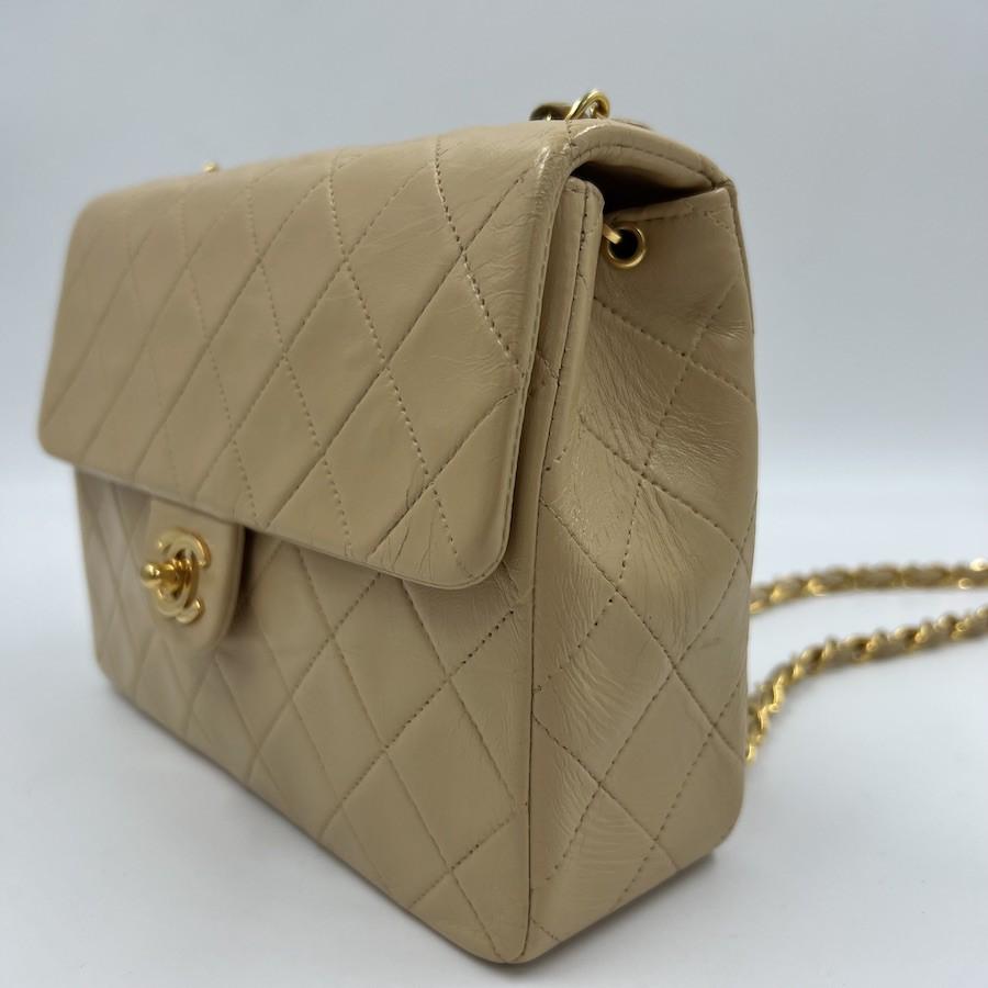 Women's CHANEL Vintage Mini Timeless 20 cm in Beige Quilted Lamb Leather