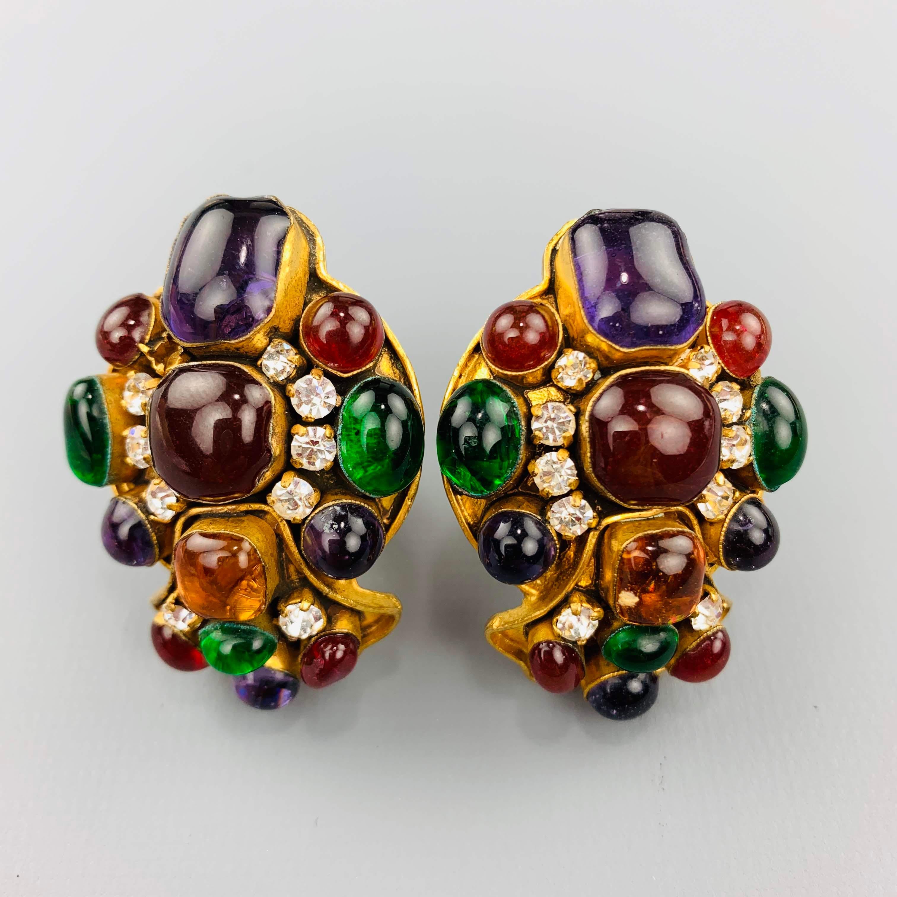 Vintage CHANEL circa 1993 clip on Gripoix Byzantine style clip on earrings come in gold tone metal with a cluster of multi color stones and  clear rhinestones. Missing one stone. As-is. Made in France.
 
Good Pre-Owned Condition.
Marked: 93
 
3 x