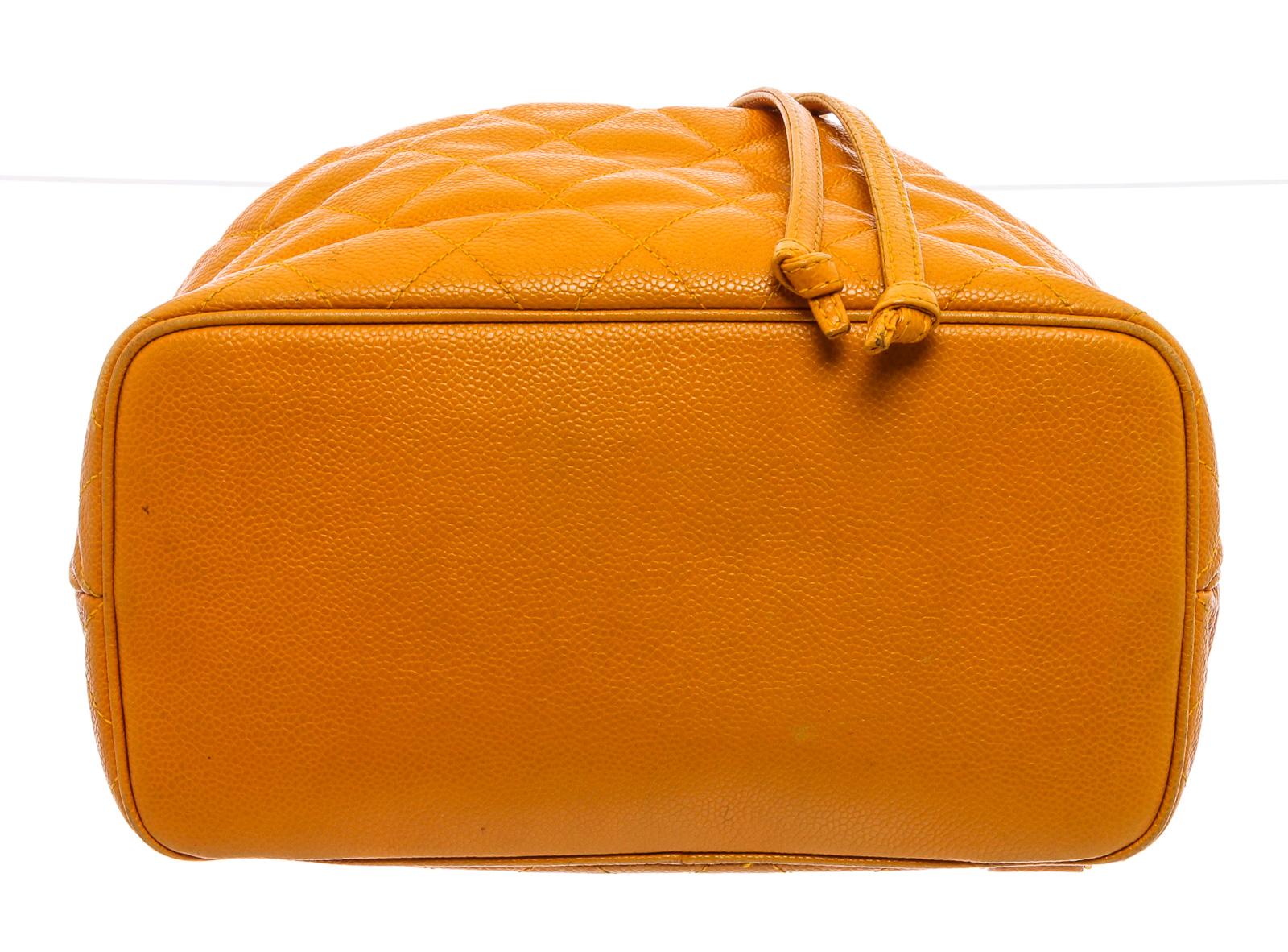 mustard yellow leather backpack