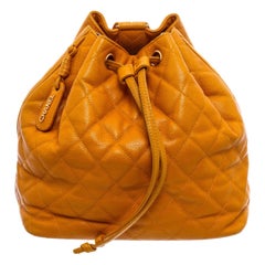 Chanel Vintage Mustard Yellow Caviar Leather Drawstring Backpack