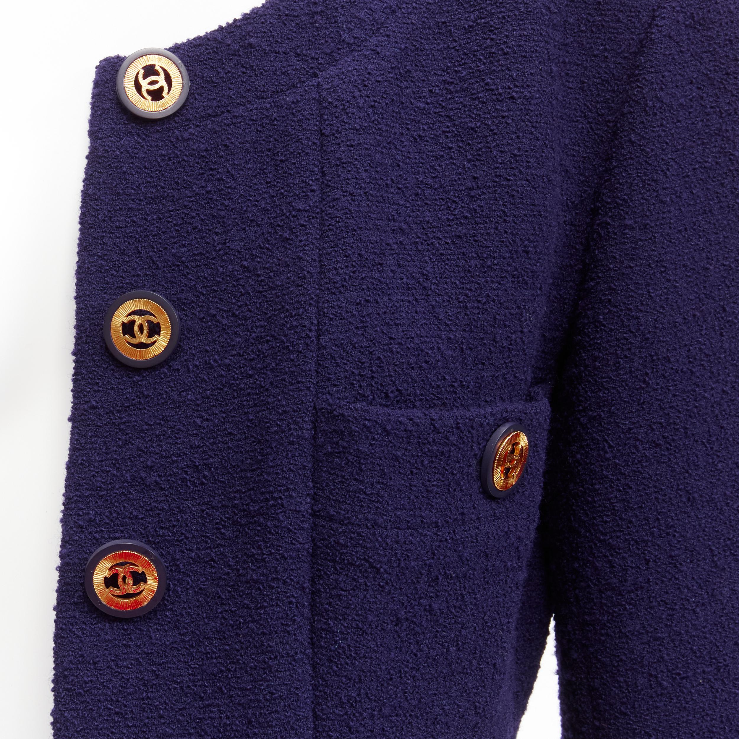 CHANEL Vintage navy blue tweed gold CC buttons 4 pocket jacket
Reference: LNKO/A02113
Brand: Chanel
Designer: Karl Lagerfeld
Material: Feels like wool
Color: Blue, Gold
Pattern: Solid
Closure: Button
Lining: Blue Silk

CONDITION:
Condition: