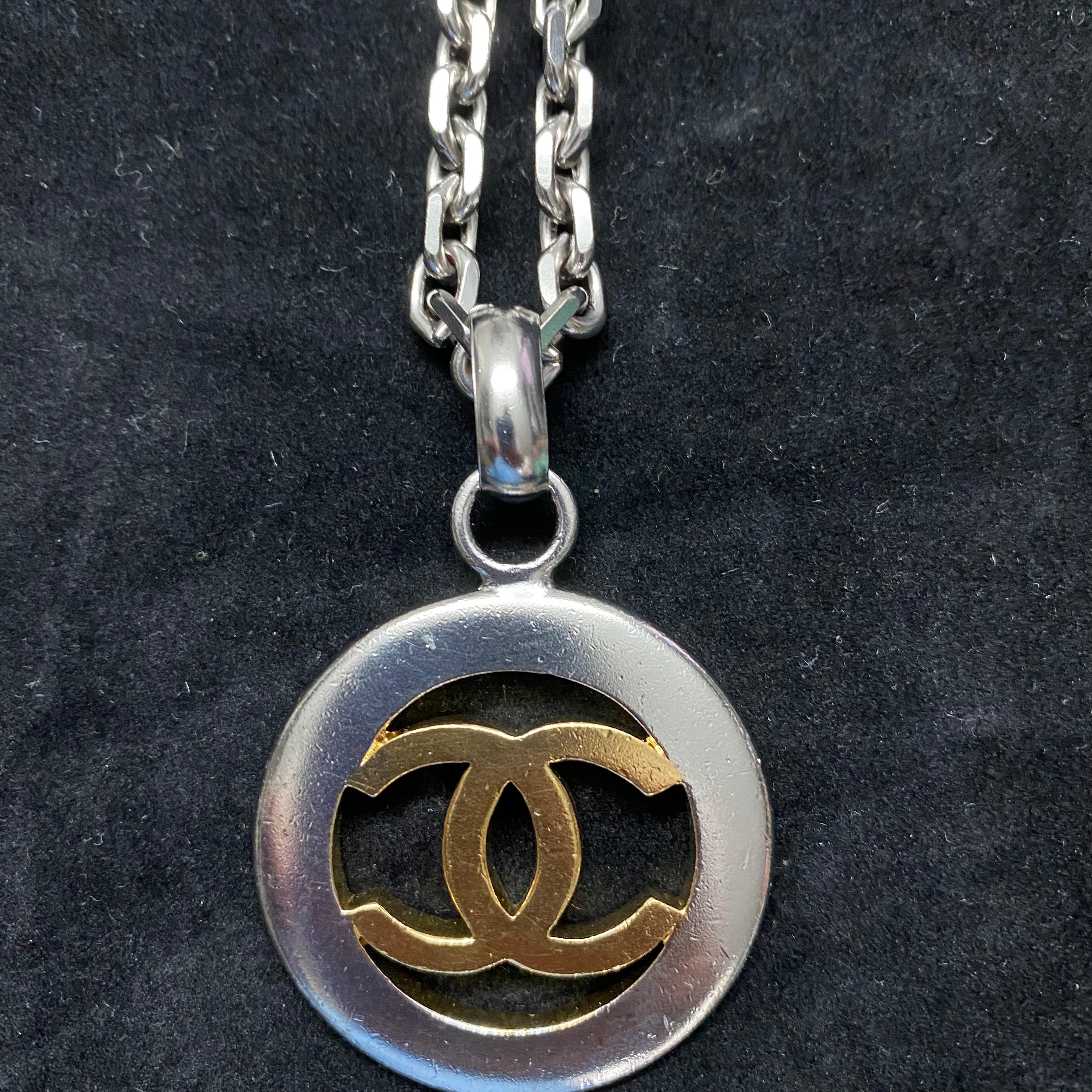 Chanel Vintage -  Necklace with CC pendant in Gold and Silver coated Metal In Good Condition In Aci Castello, IT
