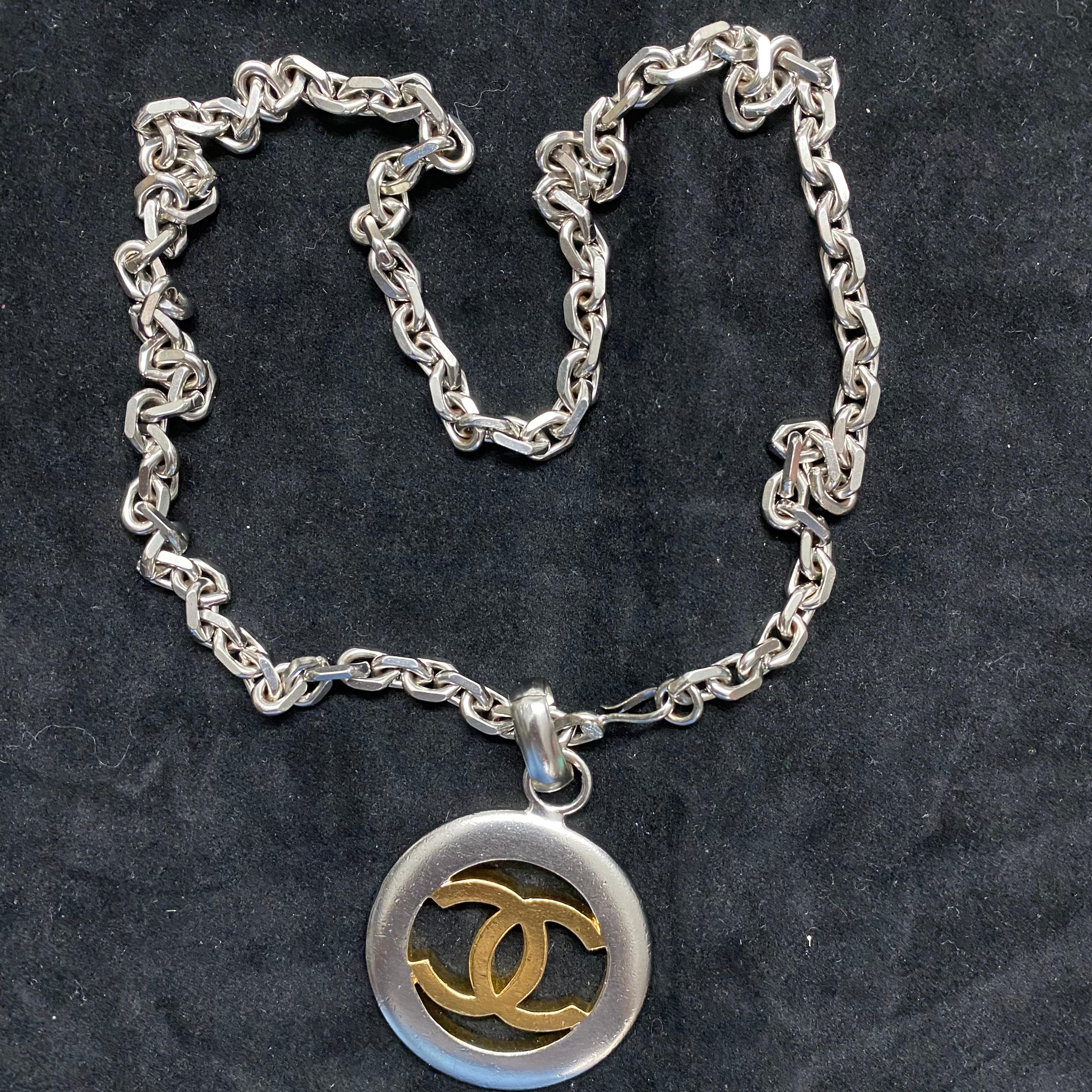 Chanel Vintage -  Necklace with CC pendant in Gold and Silver coated Metal 3