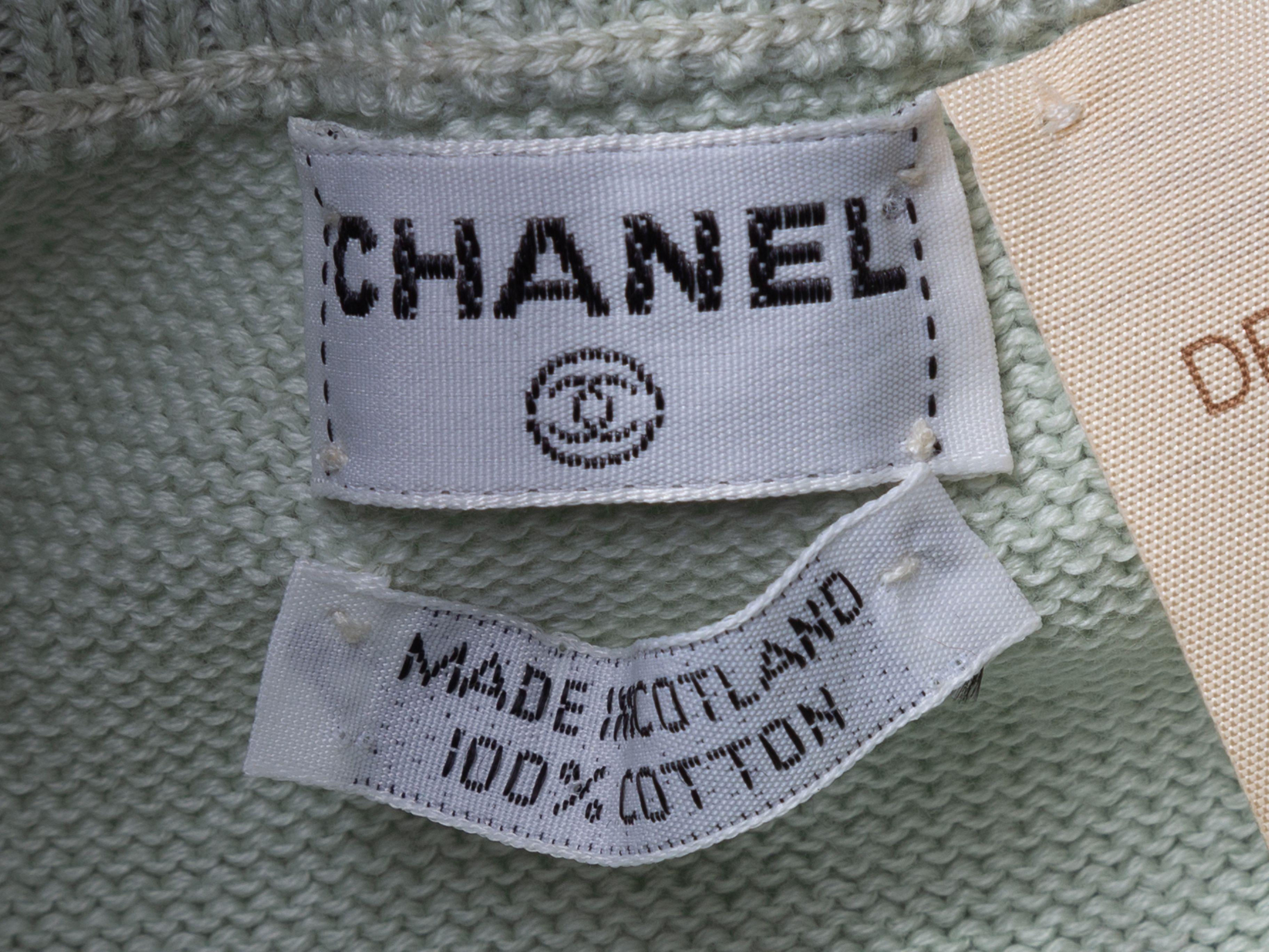 Product Details: Vintage pale blue knit skirt by Chanel. Elasticized waistband. 30
