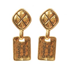CHANEL Vintage PARIS name plate gold tone quilted statement clip on earring