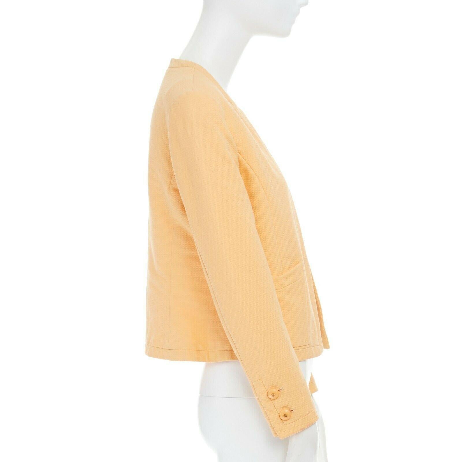 Women's CHANEL Vintage pastel orange cotton collarless decorative button short jacket S