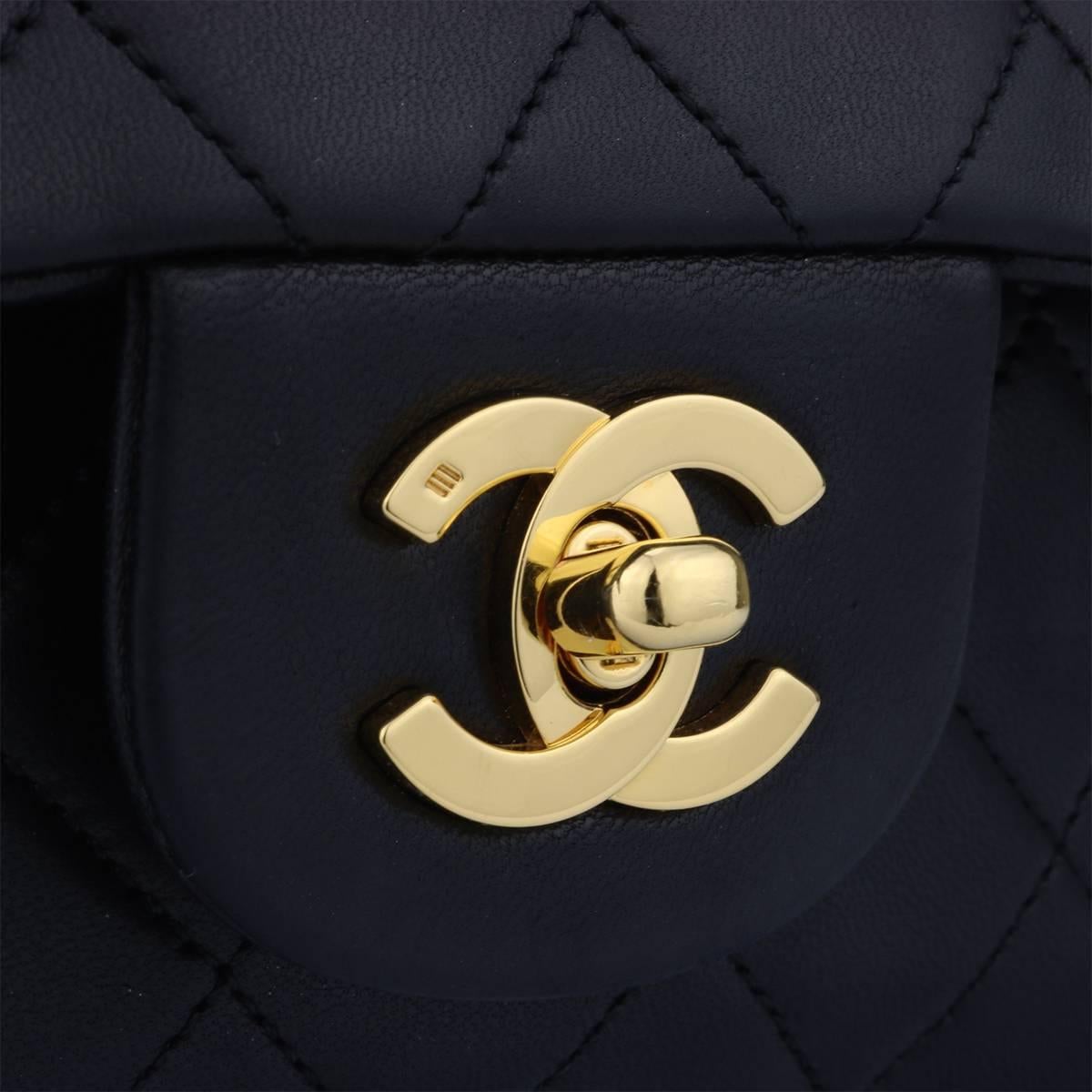 Authentic CHANEL Vintage Classic Quilted Double Flap Small Black Lambskin with Gold Hardware 1991.

This stunning bag is still in a great condition for its age, and the leather feels luxuriously soft.

Exterior Condition: Great condition. Corners