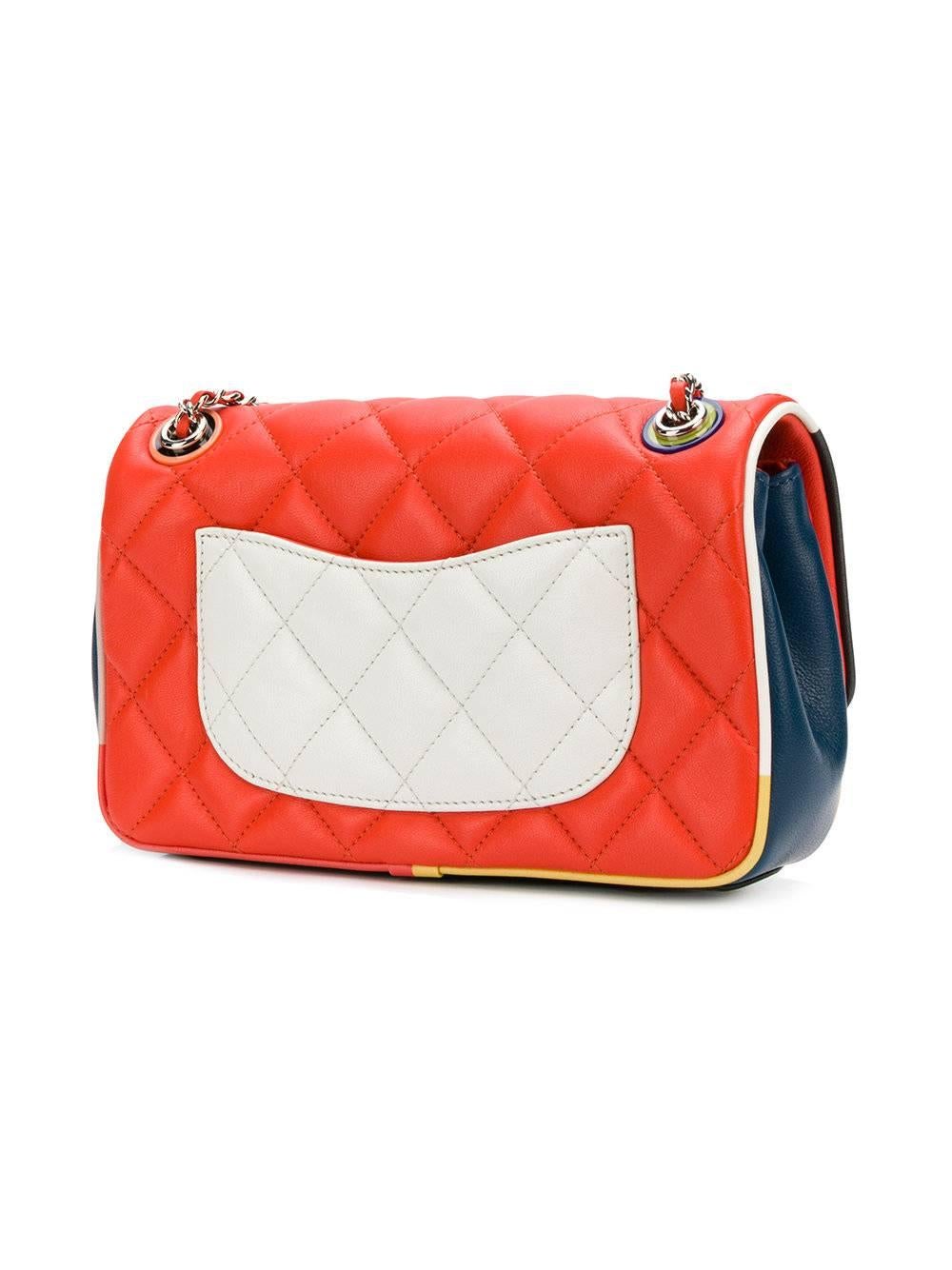 This Red lambskin quilted flap bag from Chanel Vintage featuring a foldover top with magnetic closure, a main internal compartment, a signature interlocking CC logo and a chain link strapThe perfectly timeless everyday bag!

Colour: