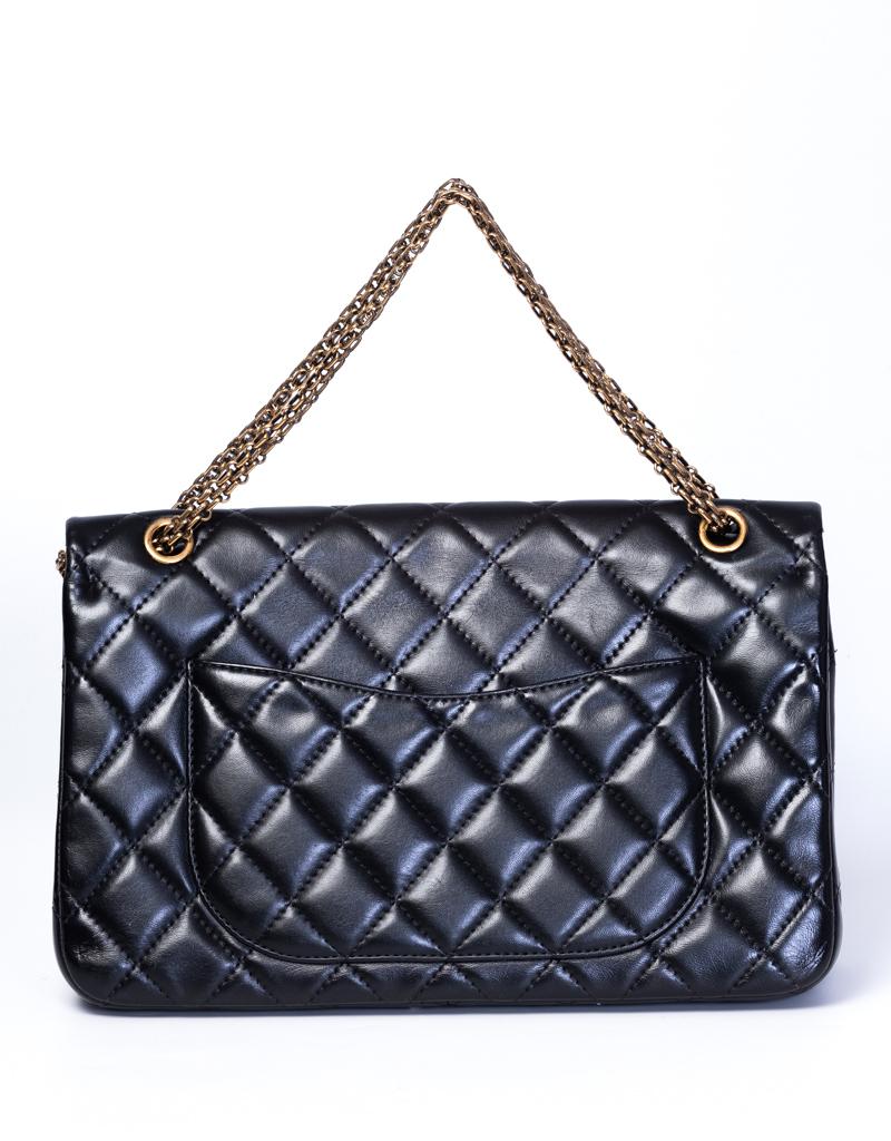 This bag is made with black diamond quilted lambskin leather. Featuring gold toned hardware, a gold toned chain interlace with leather, a flap with a Mademoiselle CC turn lock closure, a burgundy leather lined interior with two sleeve pockets, and a