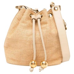 Chanel Vintage Raffia Straw Jute Gold CC Balls 90
s Drawstring Bucket Bag Chanel Vintage Raffia Straw Jute Gold CC Balls 90
s Drawstring Bucket Bag
