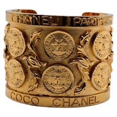 Chanel Vintage Rare Gold Metal Coin CC Logos Cuff Bangle Bracelet