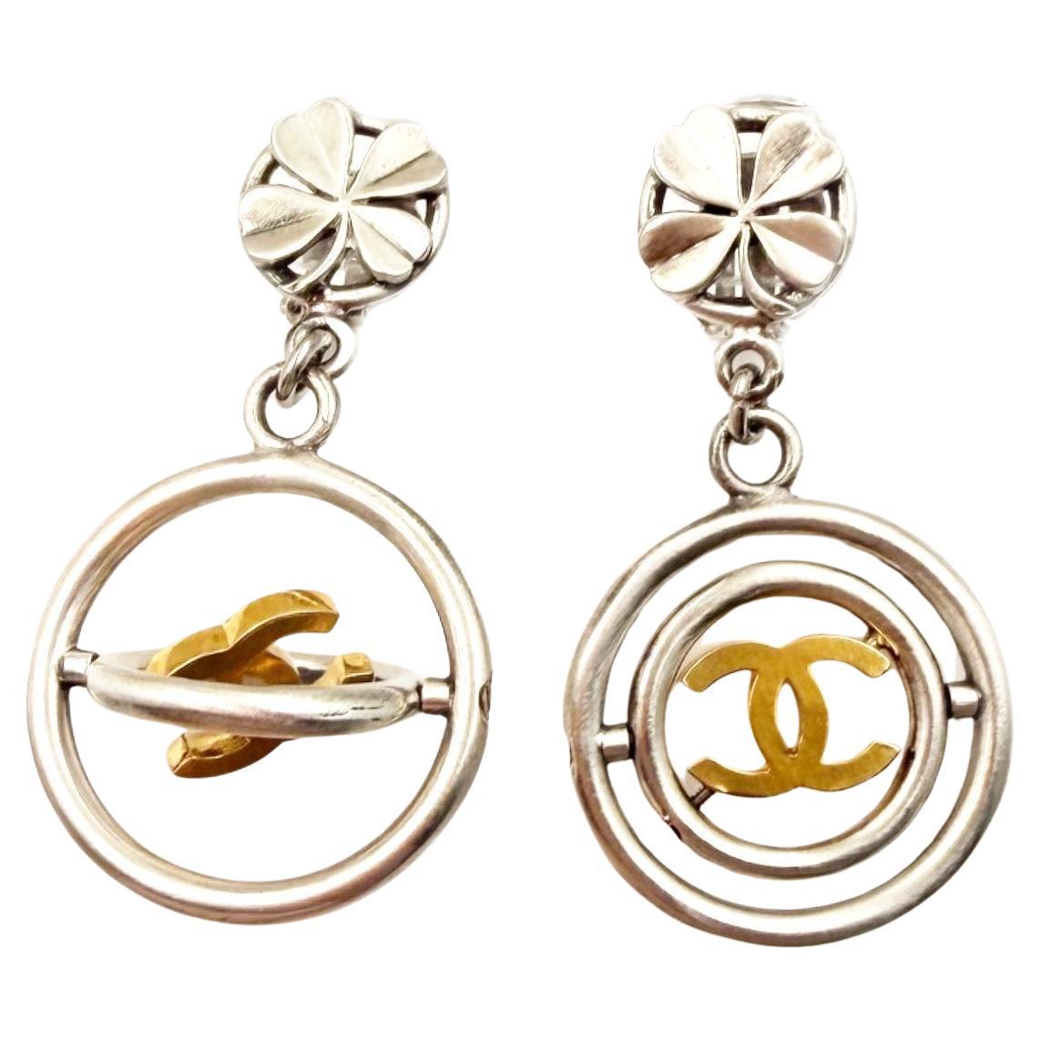 Chanel Vintage Rare Silver Round Clove Gold Spinning CC Clip on Earrings