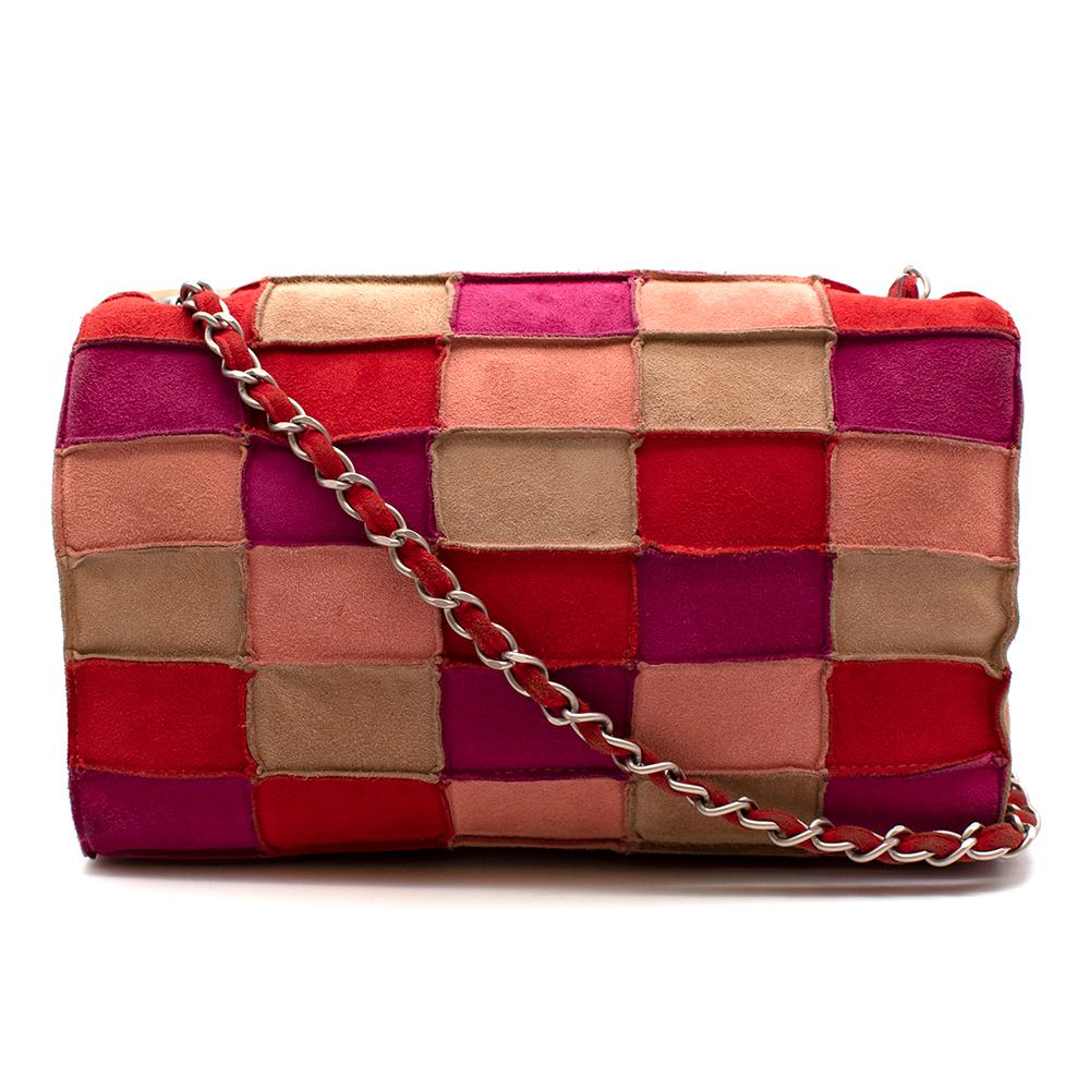 Chanel Red and Pink Suede Reissue Patchwork Flap Bag

- Shoulder chain strap
- Lock closure clasp
- Patchwork detailing
- Red, pink, taupe
- Reissue flap bag
- Silver hardware

Materials:
Suede

Made in France

Measurements:
Approx. 
Handle Drop