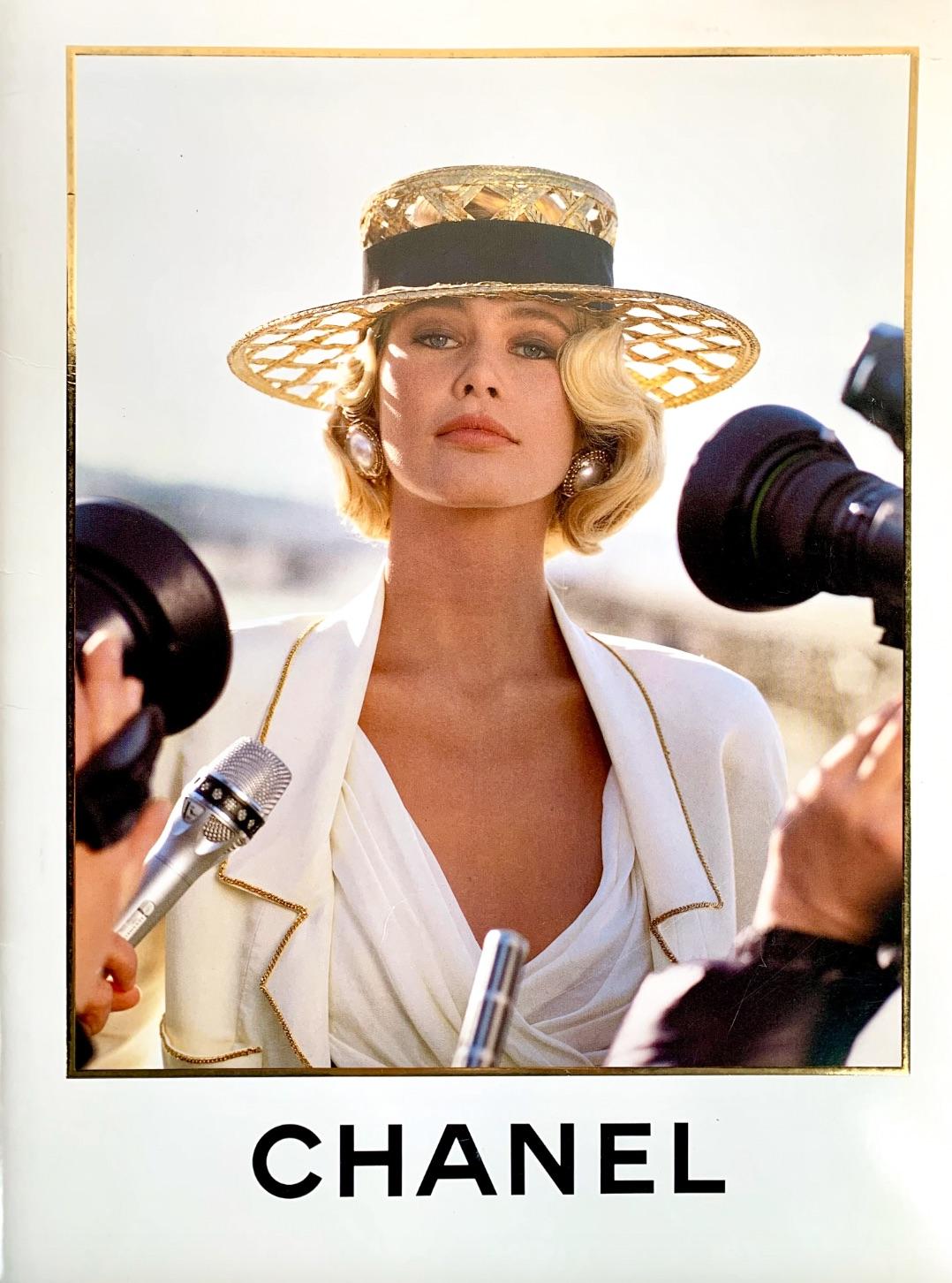 Introducing a rare cream silk jacket from Chanel's coveted Spring/Summer 1990 collection, famously showcased by Claudia Schiffer on the catalogue cover. This exquisite piece boasts a slightly cropped fitted silhouette and practical front pockets.