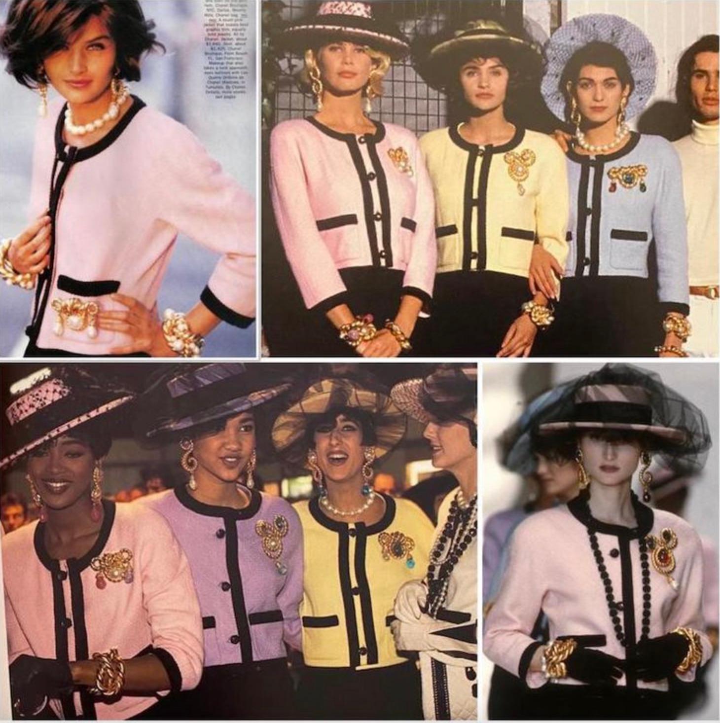 Chanel Spring/Summer 1990 pink and black tweed skirt suit, designed by Karl Lagerfeld. This classic two-piece features a collarless boxy jacket with signature braided trim and CC logo buttons, paired with a softly pleated knee-length skirt.