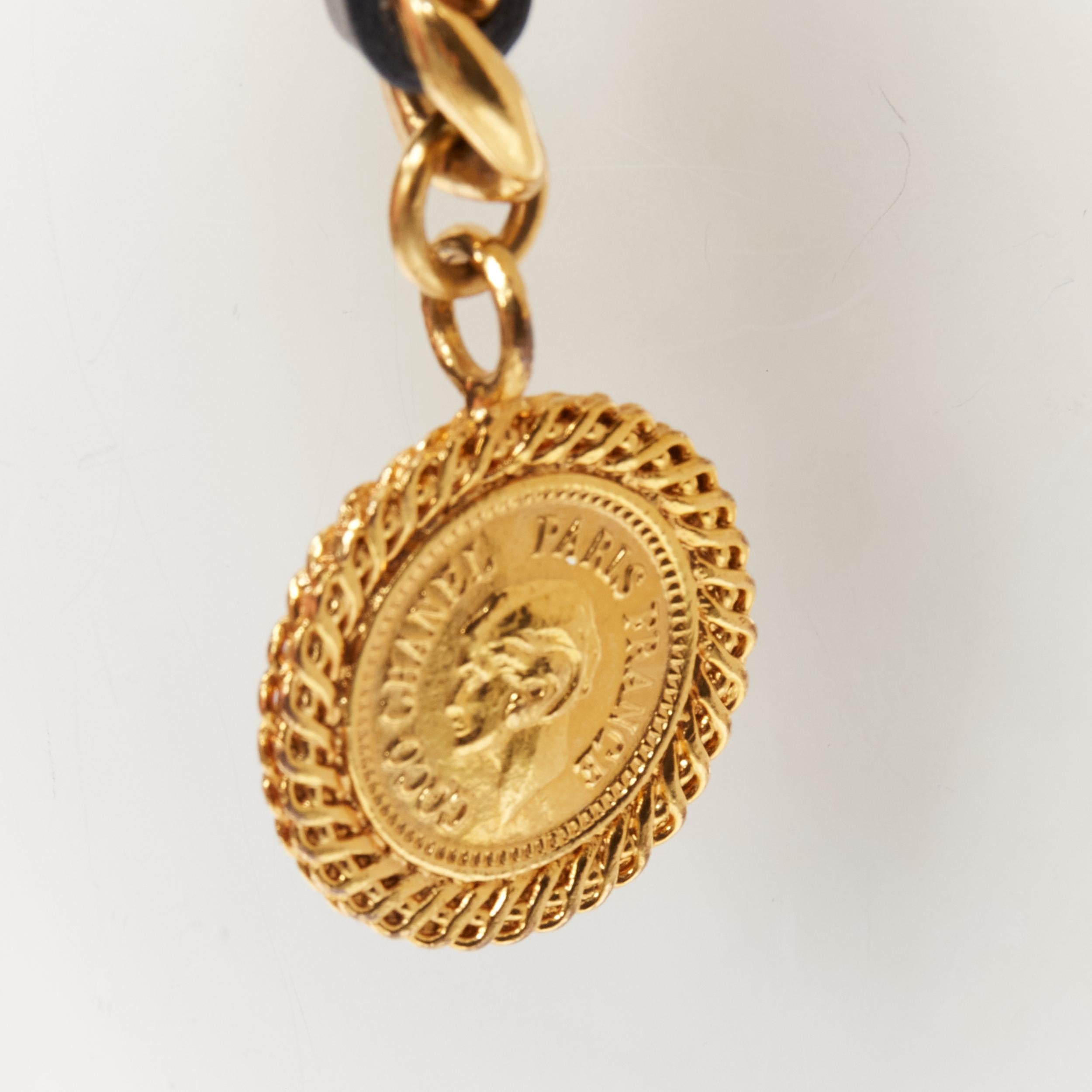 CHANEL Vintage Season 29 gold metal leather medallion coin double chain belt 
Reference: GIYG/A00226 
Brand: Chanel 
Designer: Karl Lagerfeld 
Material: Metal 
Color: Gold 
Pattern: Solid 
Closure: Hook 
Extra Detail: Gold-tone brass chain with