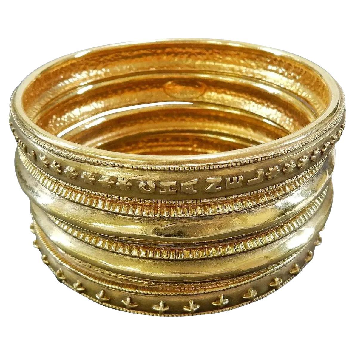 Chanel Vintage Set of 4 Gold Bangle Bracelets For Sale