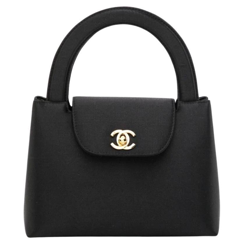 Bolso Chanel Vintage Kelly de seda con asa superior