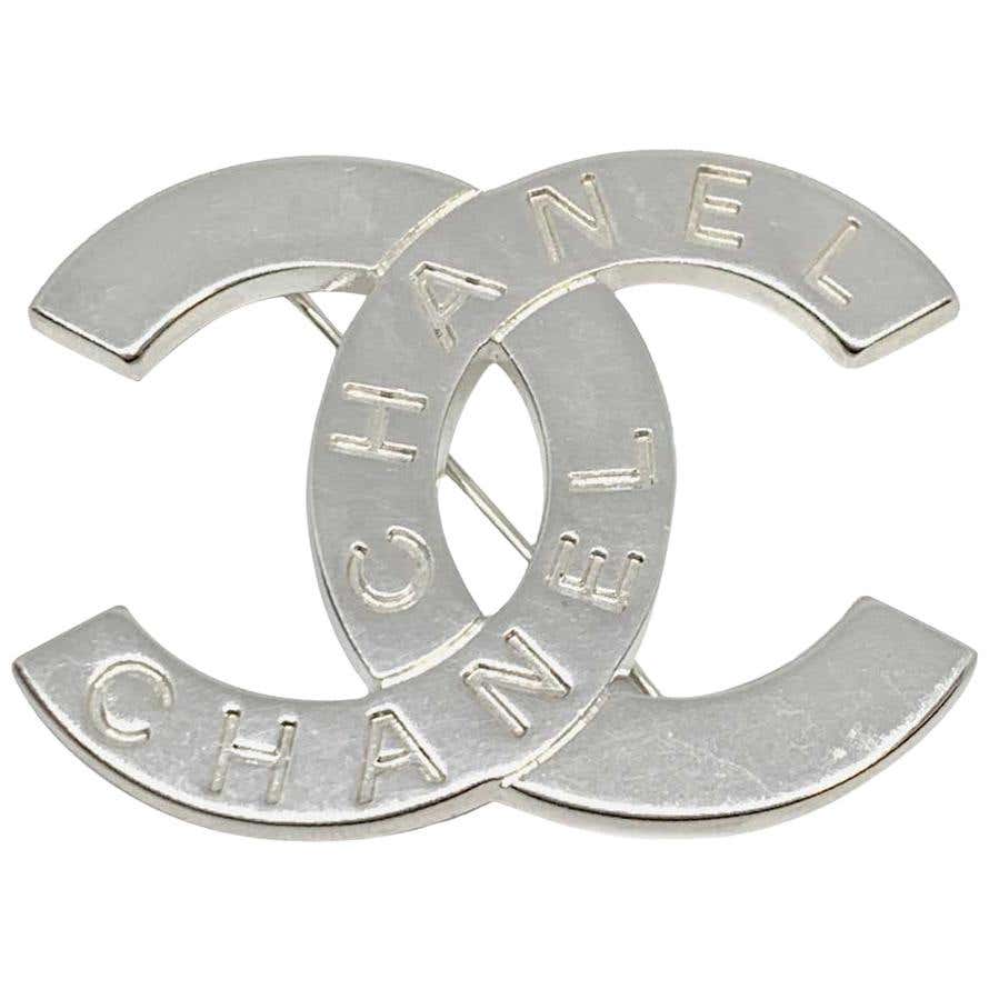 CHANEL Vintage Silver CC Brooch at 1stDibs | chanel brooch