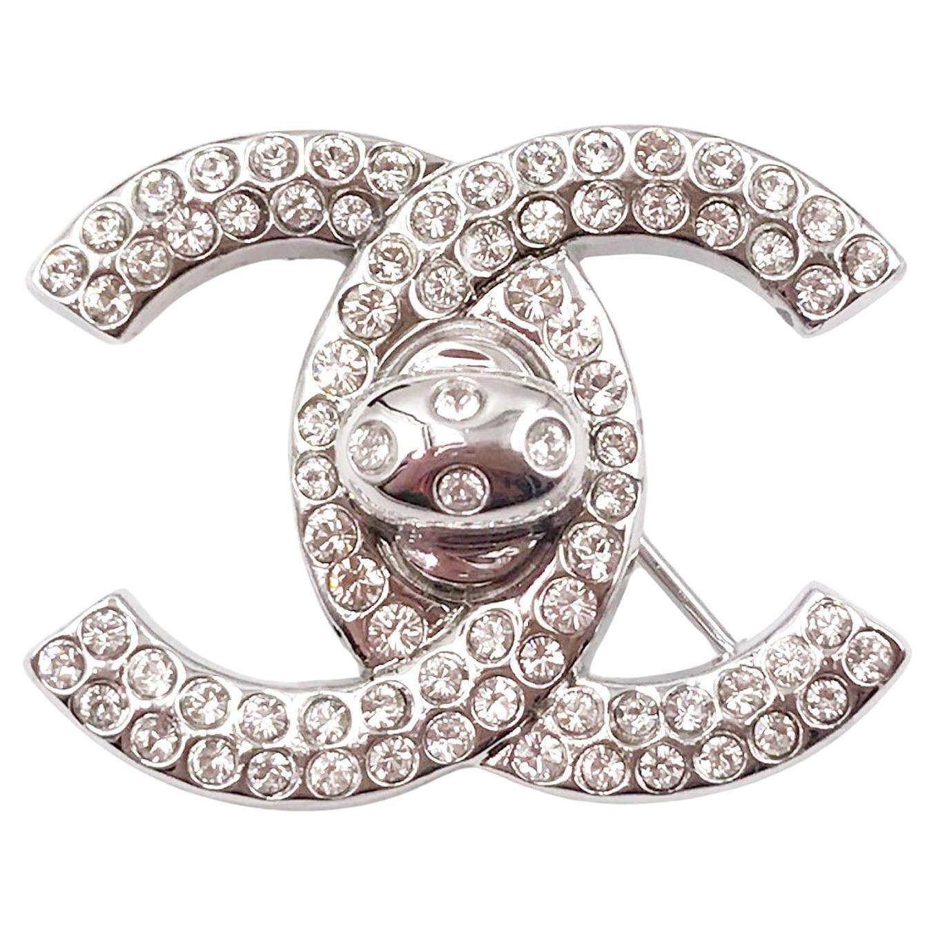 Chanel Vintage Silver CC Crystal Turnlock Brooch   For Sale