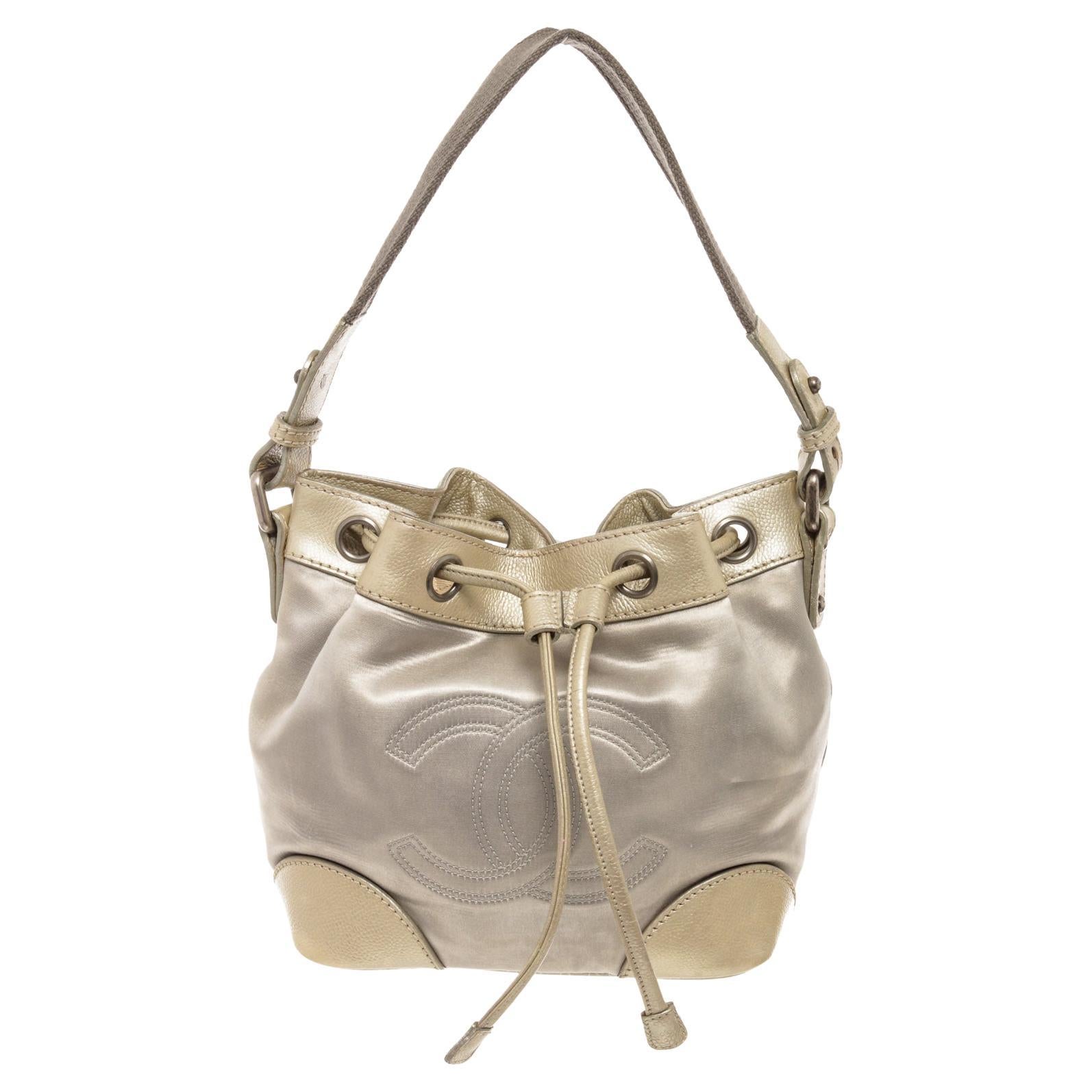 Chanel Vintage Silver Leather CC Drawstring Bucket Bag at 1stDibs