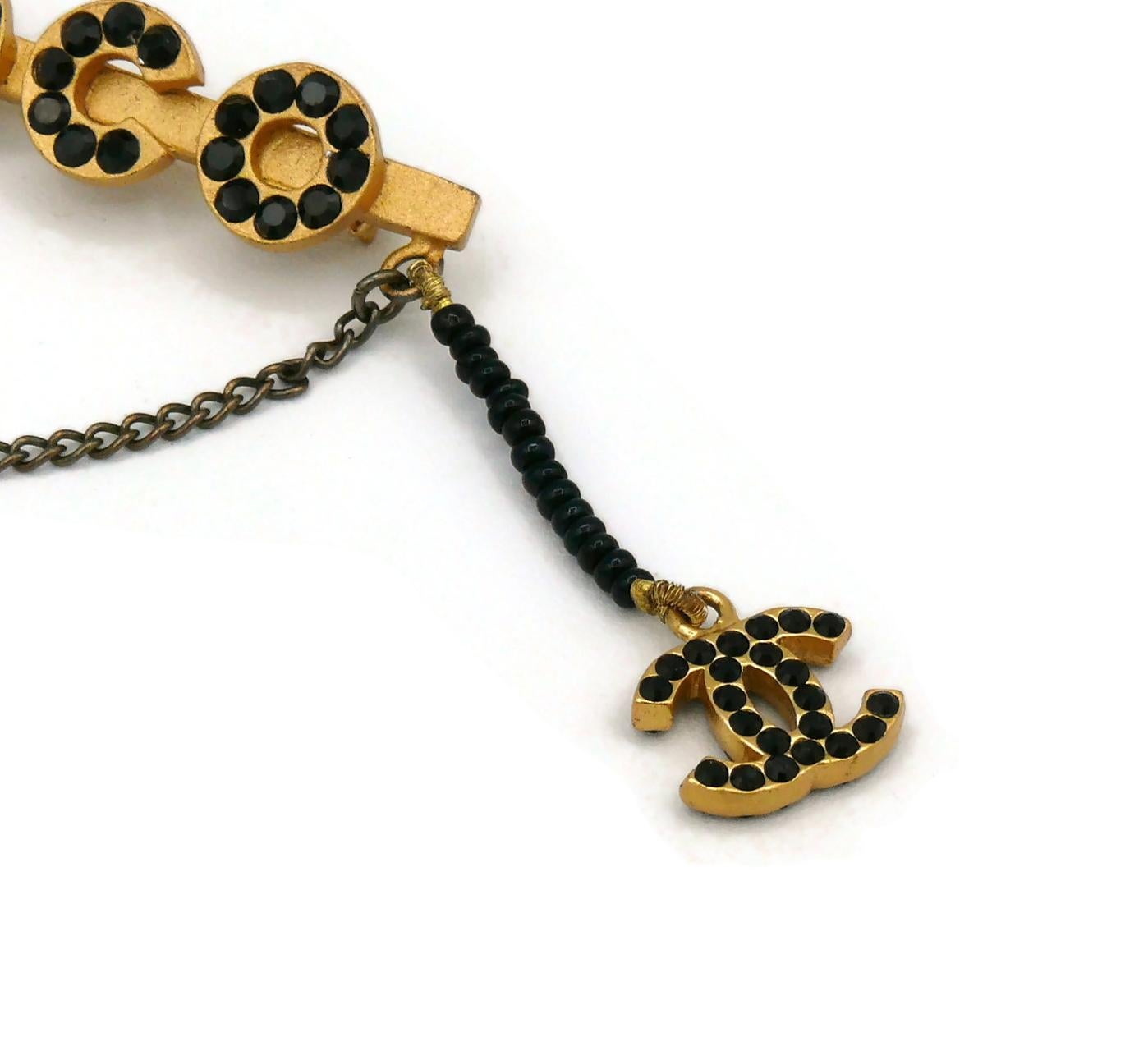 Chanel Vintage Spelling C O C O Black Crystal Brooch In Good Condition For Sale In Nice, FR