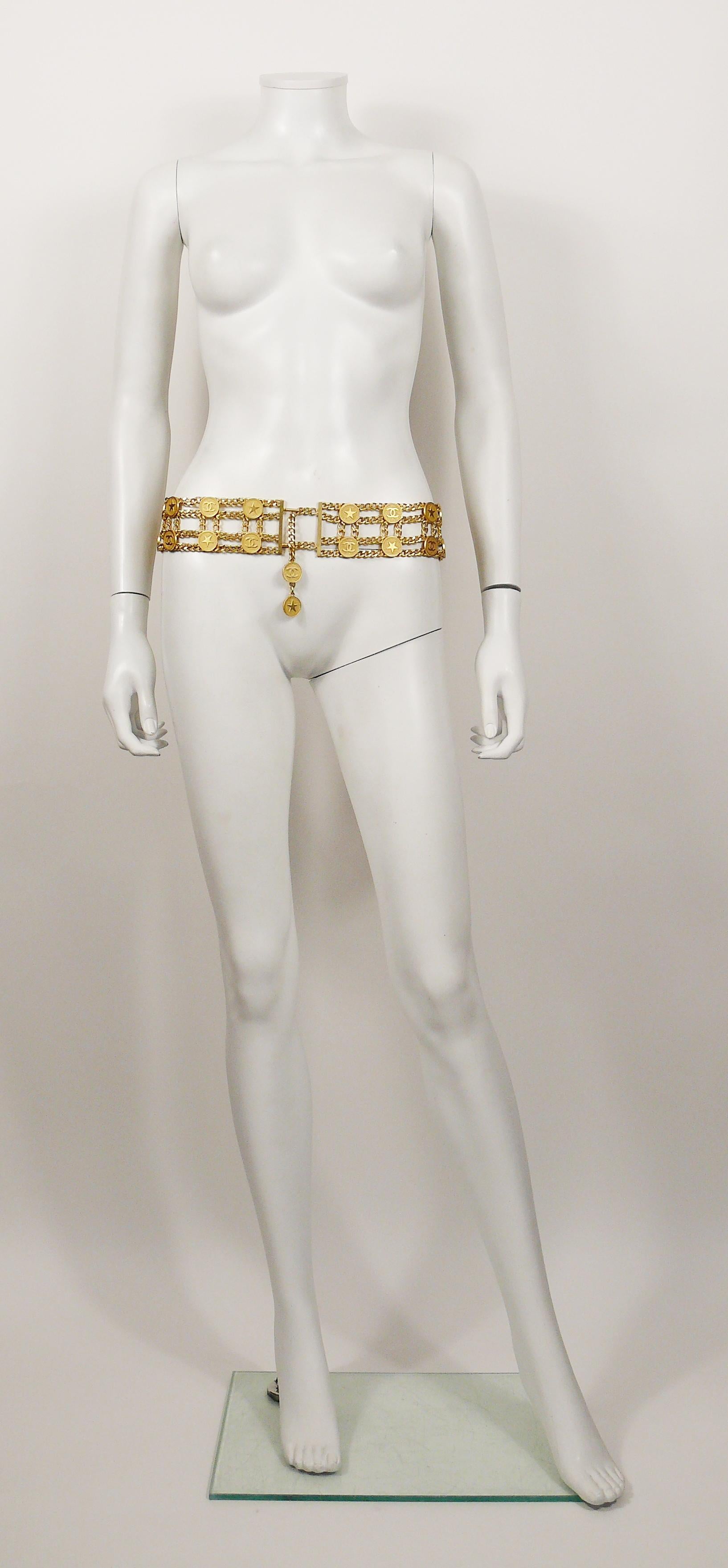 CHANEL vintage matte gold toned chain belt featuring CC coins and star emblems.

Spring/Summer Collection 2001.

Double hook clasp.

Has some weight on it (approx. 600 grams) !

Marked CHANEL 01 P Made in France.
Private sale 