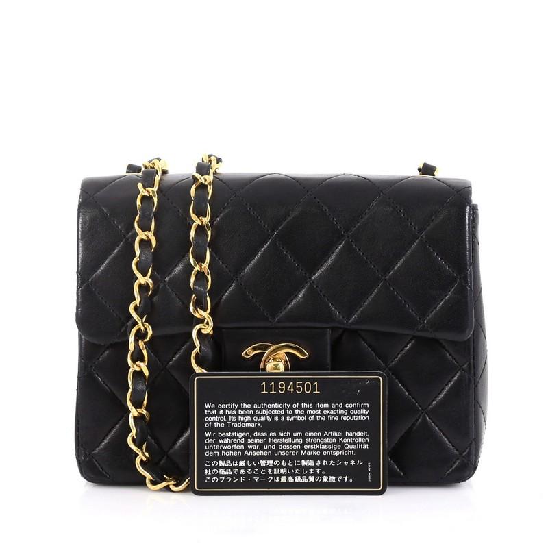 This Chanel Vintage Square Classic Single Flap Bag Quilted Lambskin Mini, crafted in black quilted lambskin, features woven-in leather chain link strap, exterior back slip pocket, and gold-tone hardware. Its CC turn-lock closure opens to a burgundy