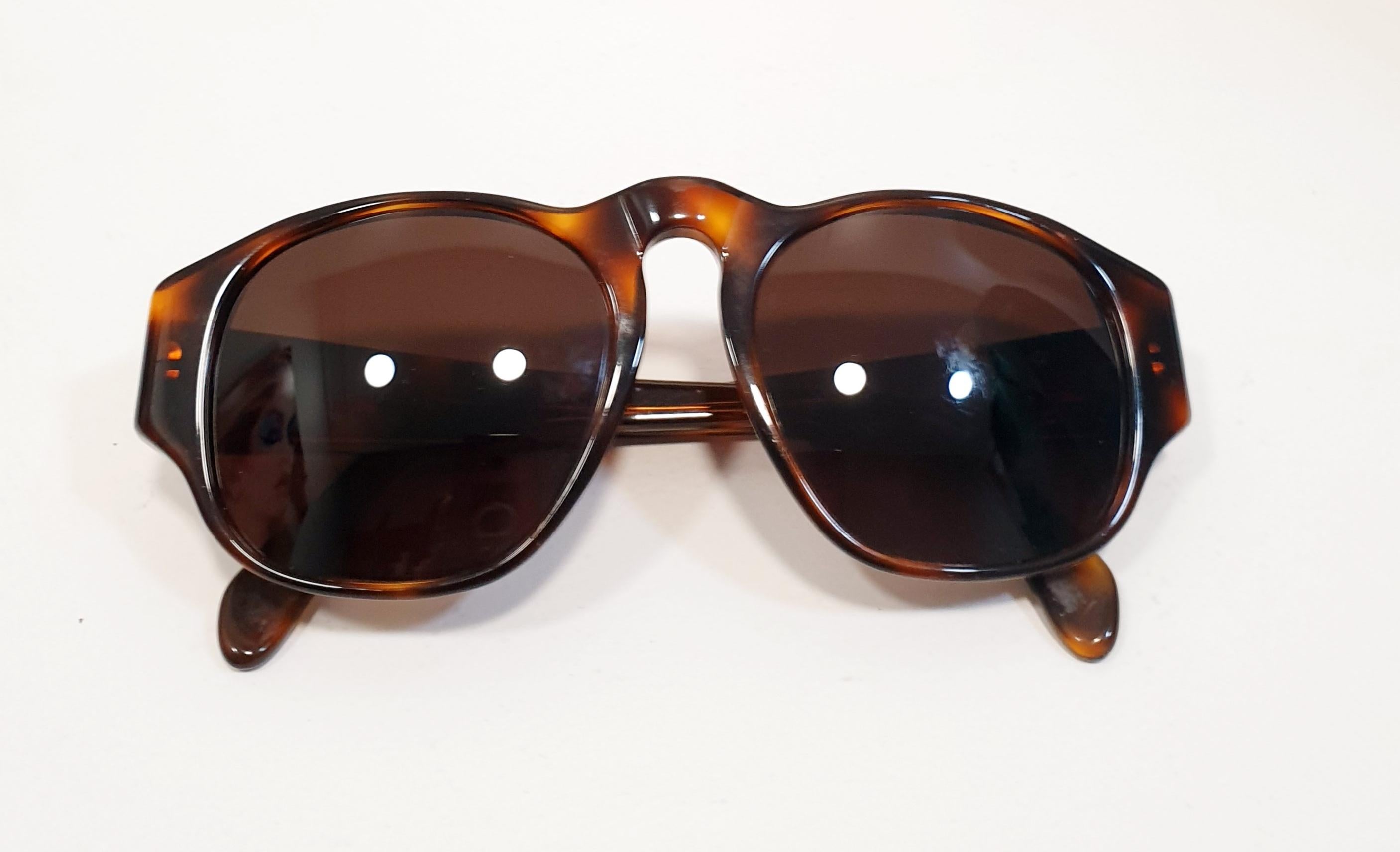 Chanel vintage sunglasses made in the late 1980s / early 1990s
Brand	Chanel
Color       Brown
Made in Italy
Material   Acetate
Model: 0006 80

READY TO SHIP
*Shipment of this piece is not affected by COVID-19. Orders welcome!*

Pradera Fashion