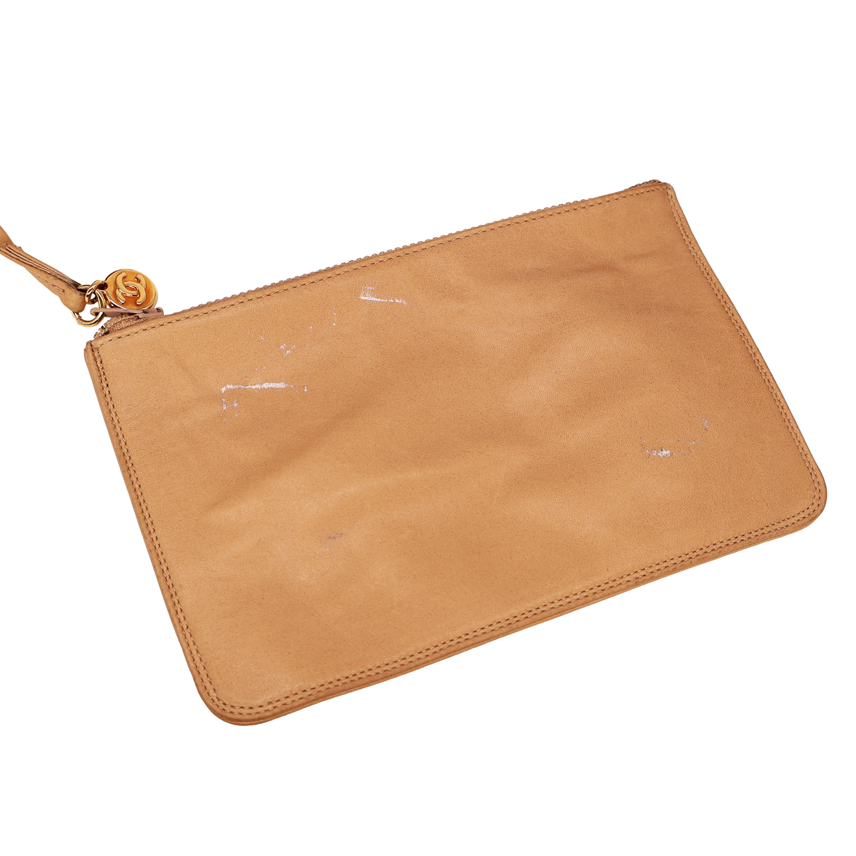 Chanel Vintage Tan Woven Raffia and Leather Drawstring Bucket Bag, 1992-1993. For Sale 6