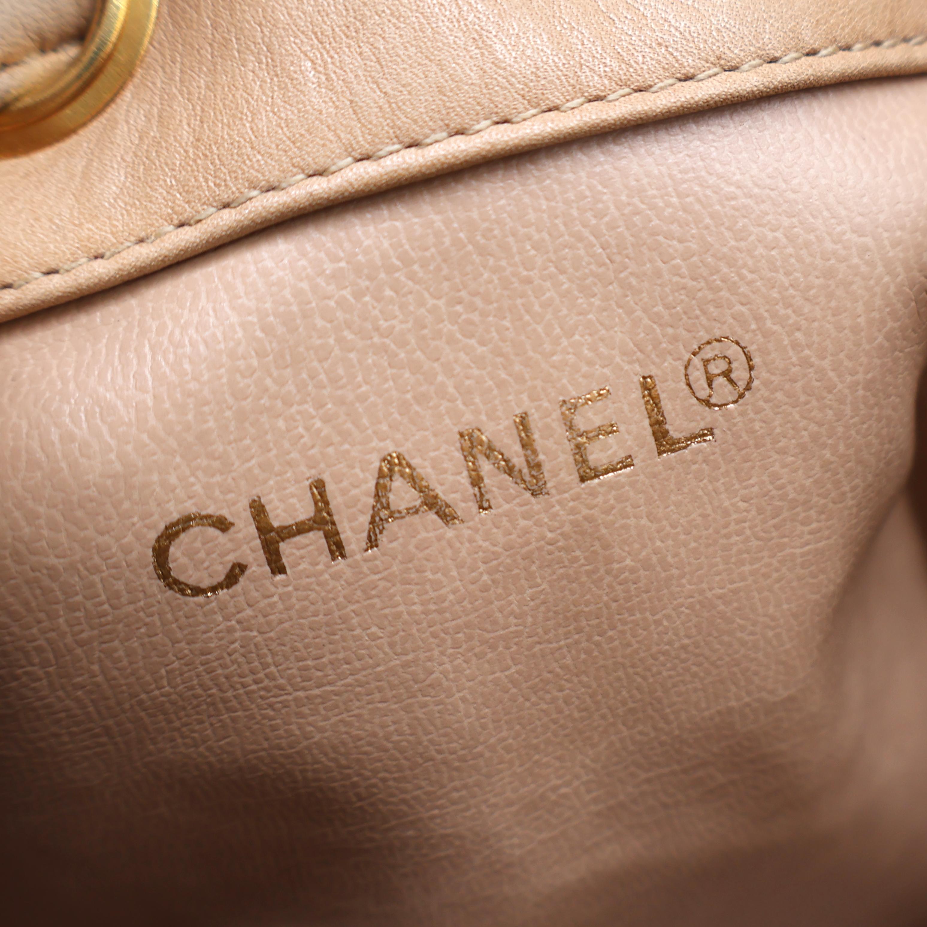 Chanel Vintage Tan Woven Raffia and Leather Drawstring Bucket Bag, 1992-1993. For Sale 7