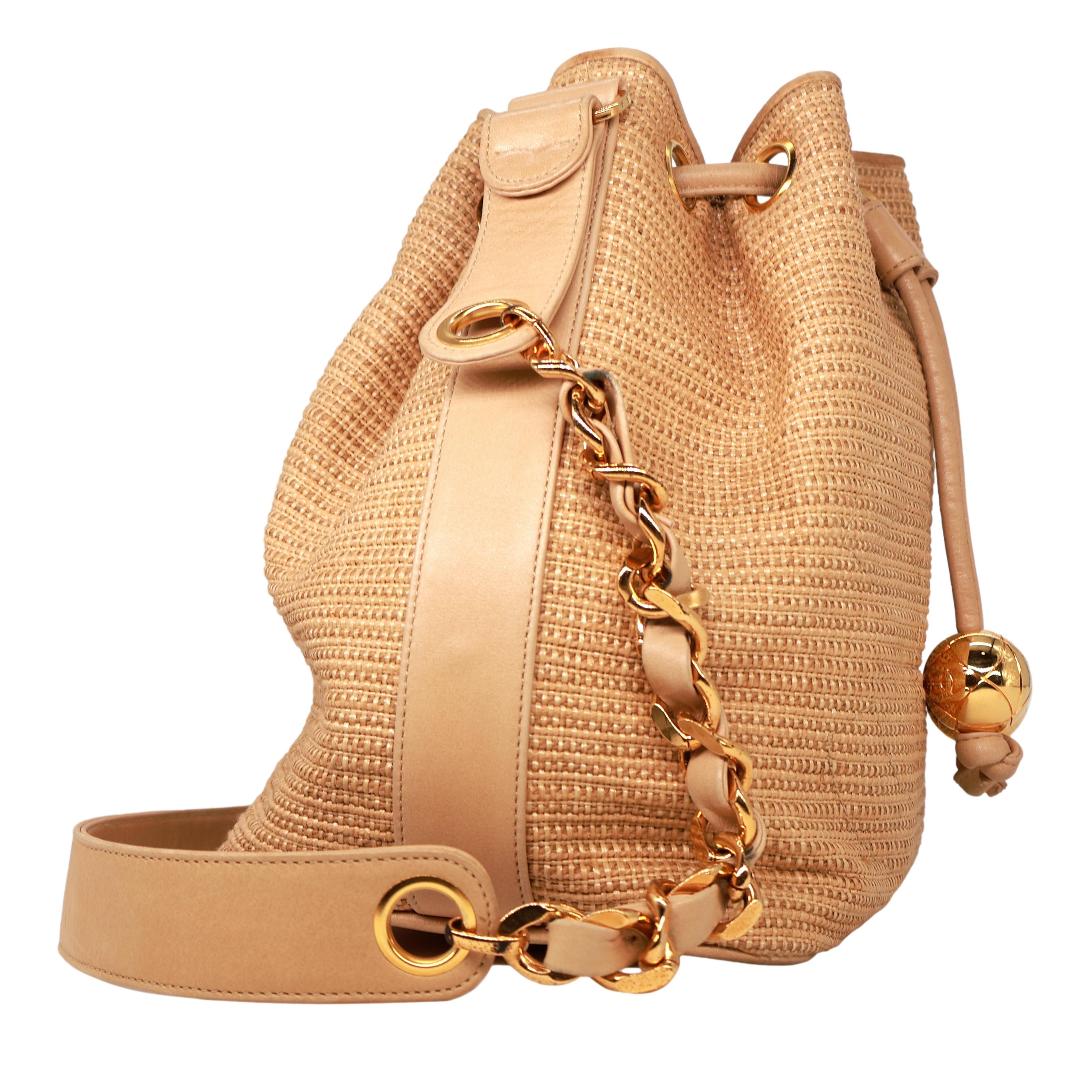 Beige Chanel Vintage Tan Woven Raffia and Leather Drawstring Bucket Bag, 1992-1993. For Sale