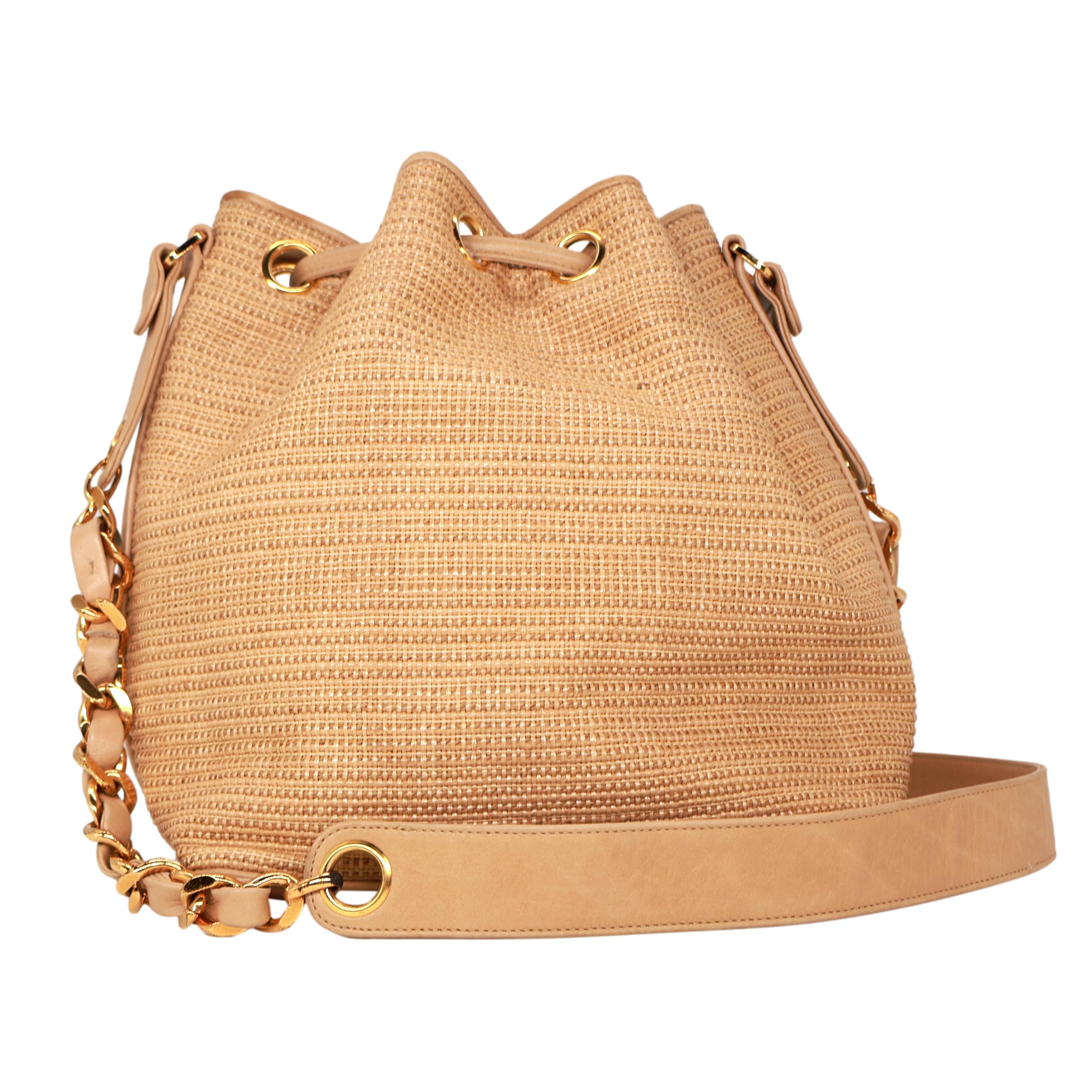 Women's or Men's Chanel Vintage Tan Woven Raffia and Leather Drawstring Bucket Bag, 1992-1993. For Sale