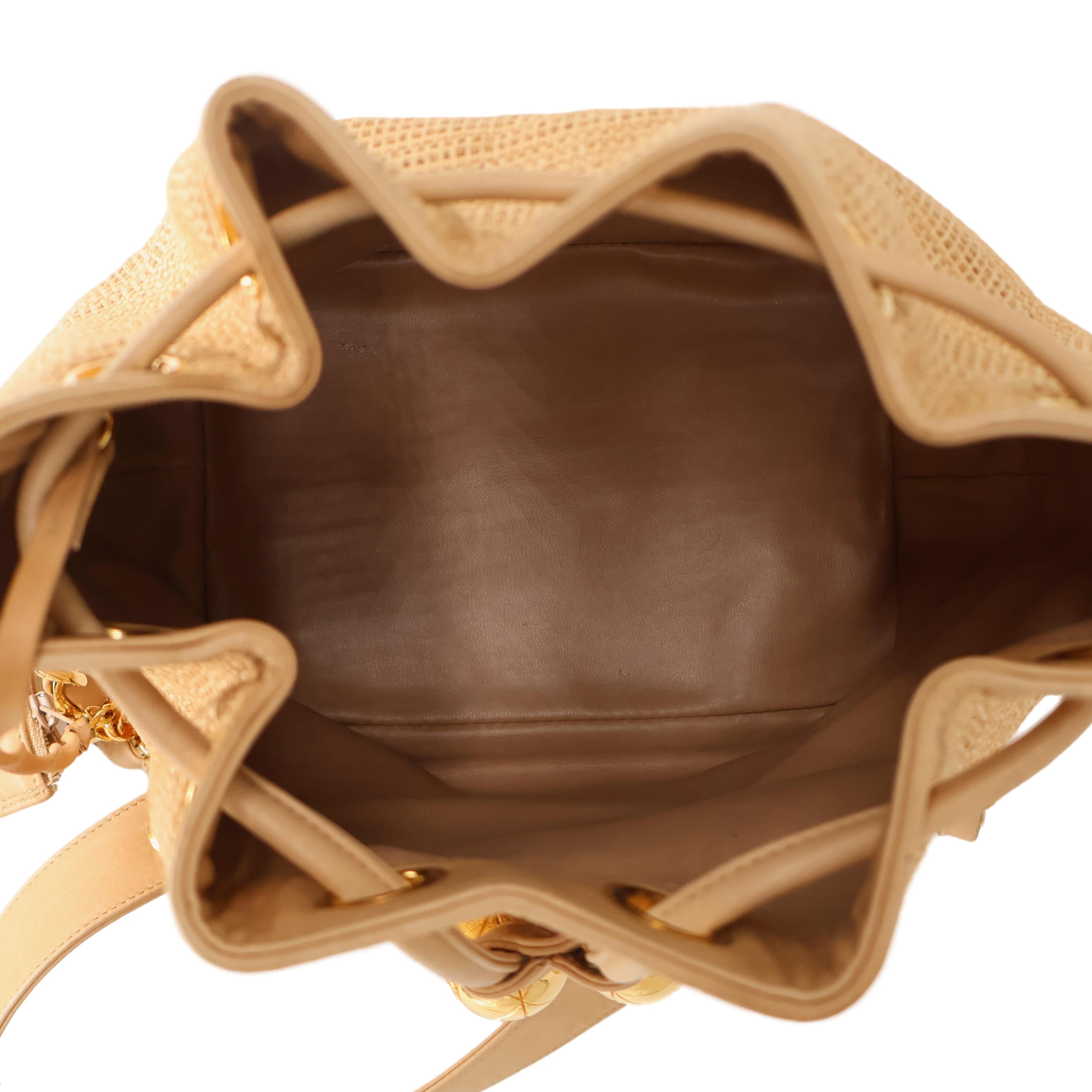 Chanel Vintage Tan Woven Raffia and Leather Drawstring Bucket Bag, 1992-1993. For Sale 1
