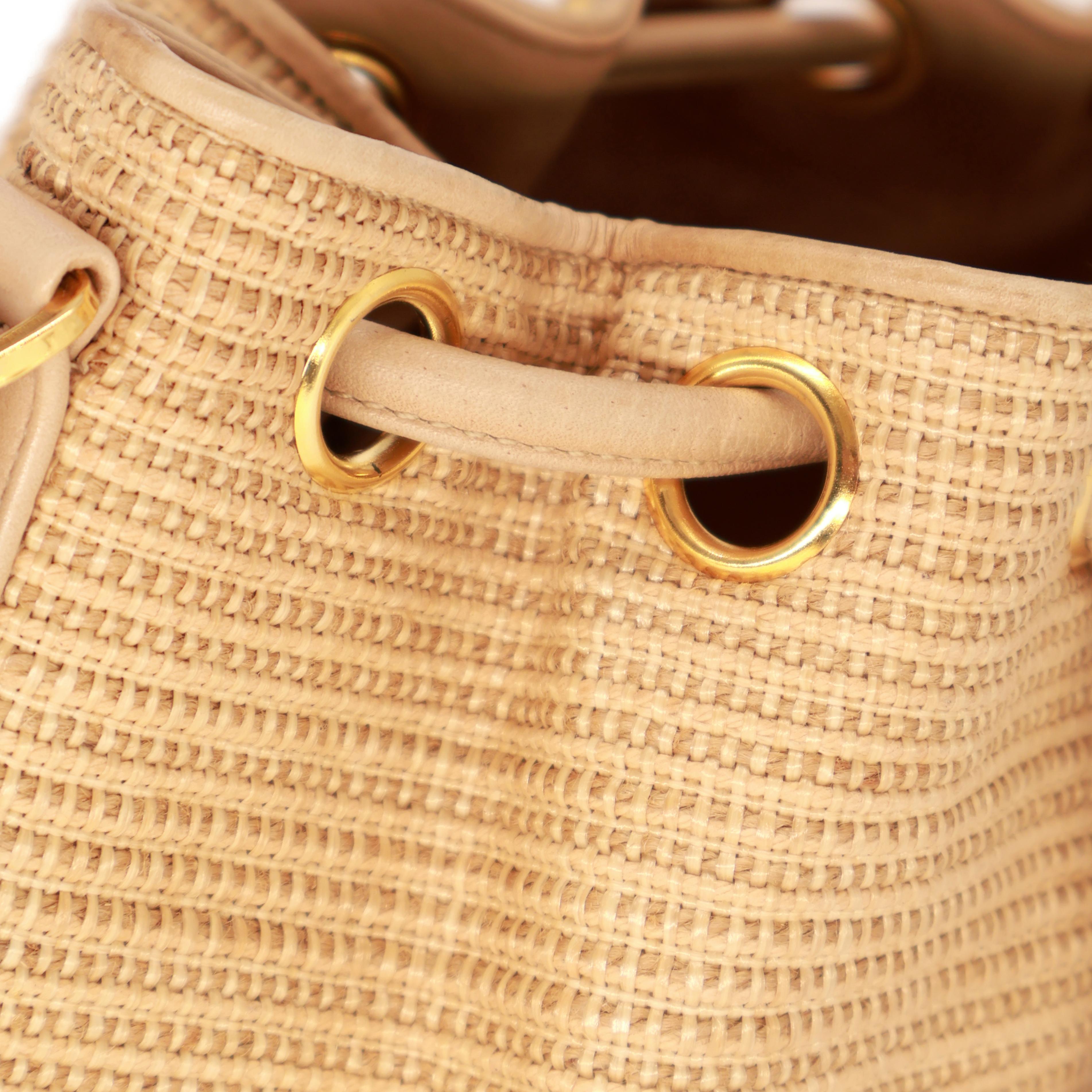 Chanel Vintage Tan Woven Raffia and Leather Drawstring Bucket Bag, 1992-1993. For Sale 4