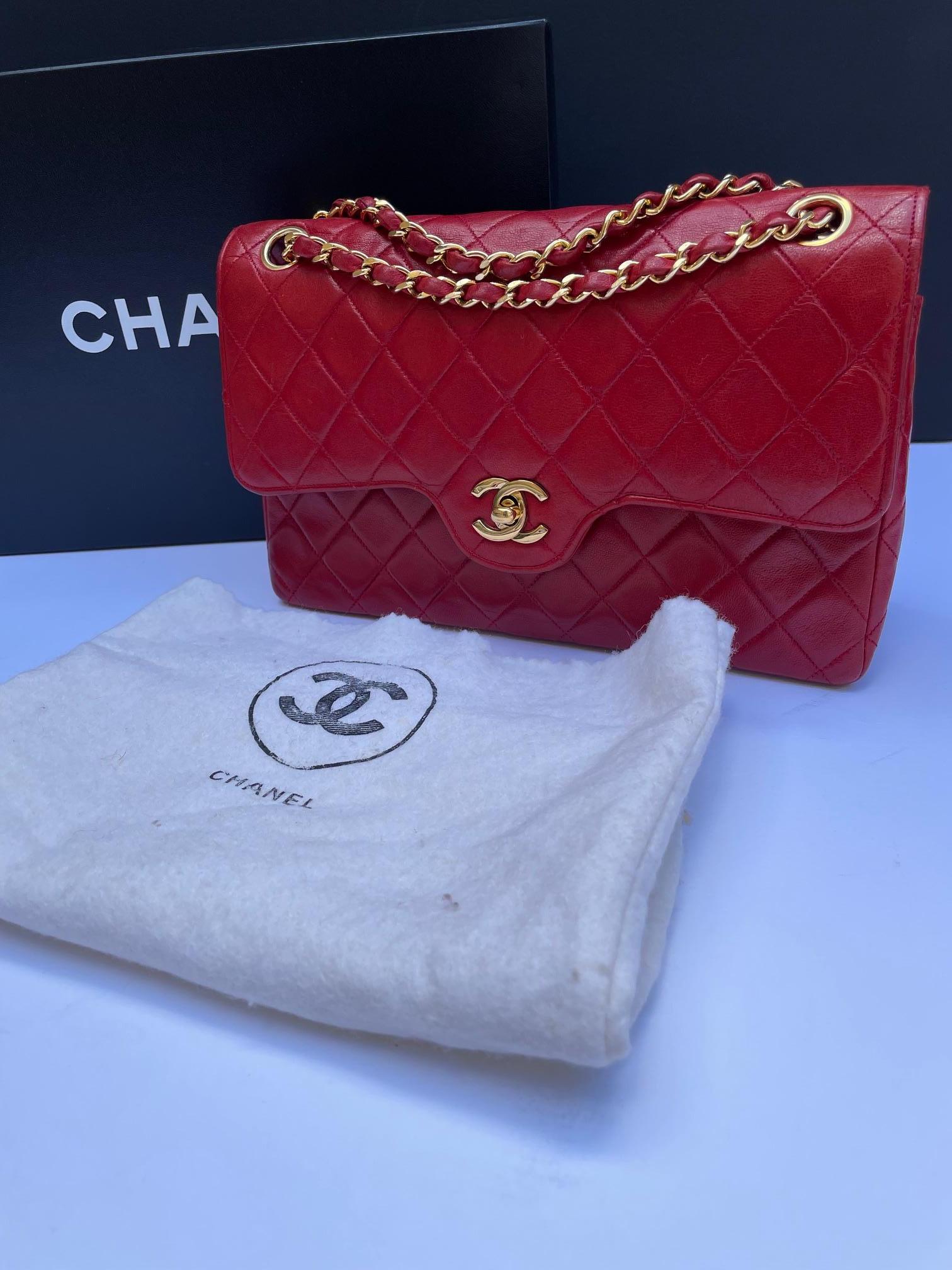 CHANEL Vintage Timeless Classic Red Quilted Double Flap Leather Shoulder Bag 1985 W/Box

Wow! an amazing RARE Chanel red timeless double flap 1985 shoulder bag. This vintage bag is amazingly beautiful and it is handcrafted with flat quilted leather
