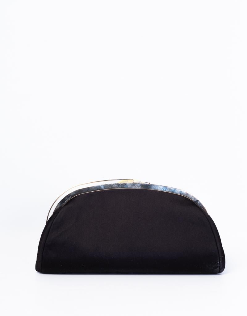 Very elegant, feminine and classy. This clutch is made of satin and features gold toned hardware and a silk lining. Chanel items bearing  the serial number 11XXXXXX are manufactured from 2006 to 2008.

COLOR: Black
MATERIAL: Satin
ITEM CODE: