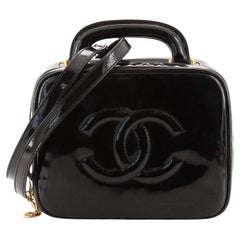Chanel Vintage 1990's Black Quilted Patent Vanity Shoulder Bag – House of  Carver