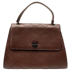 Chanel Vintage Top Handle Kelly Flap Bag Marrone Pelle di agnello Cannage, 1997-99